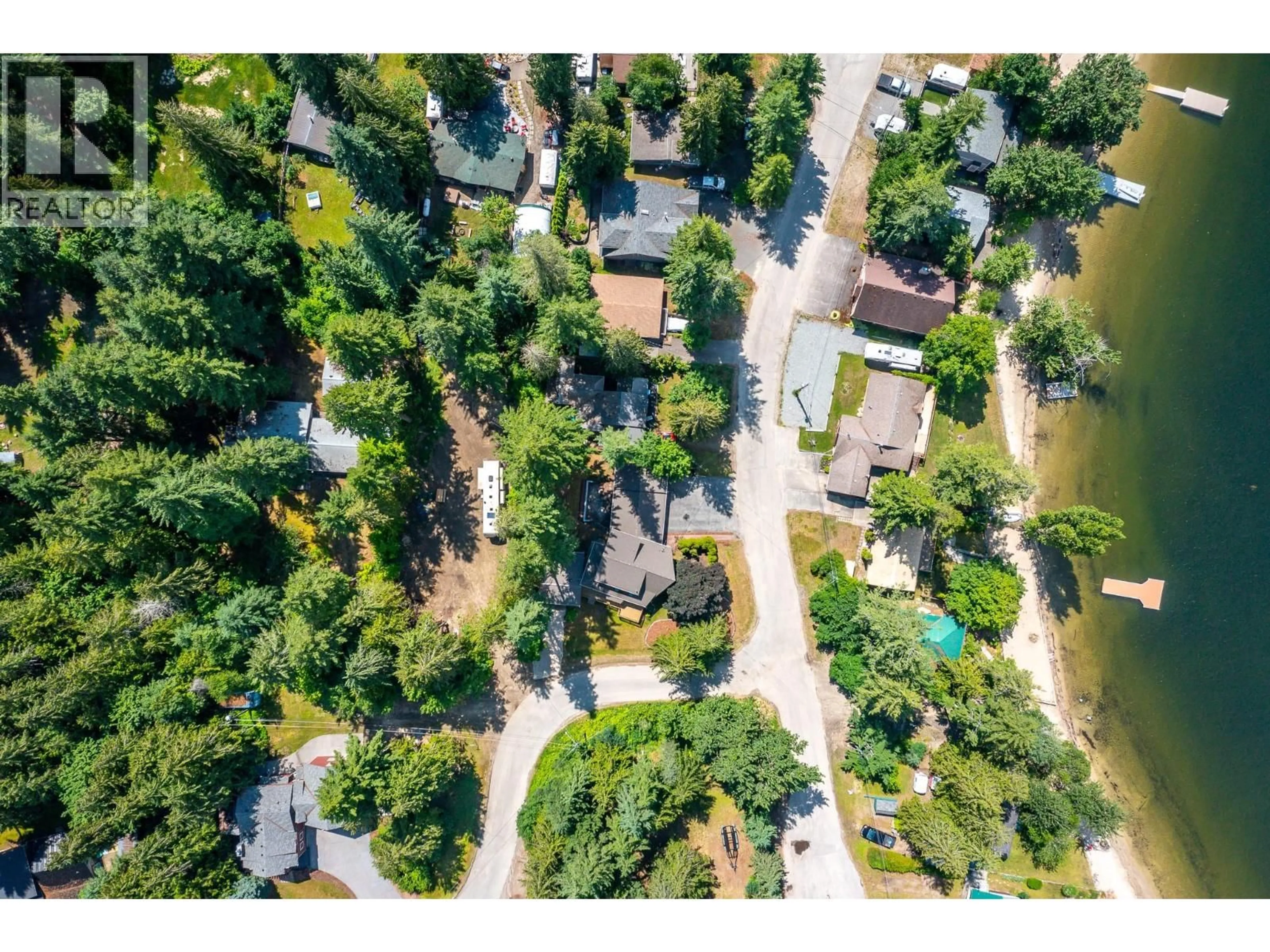 A pic from outside/outdoor area/front of a property/back of a property/a pic from drone, street for 710 & 714 WESTMINSTER ROAD, Swansea Point British Columbia V0E2K2