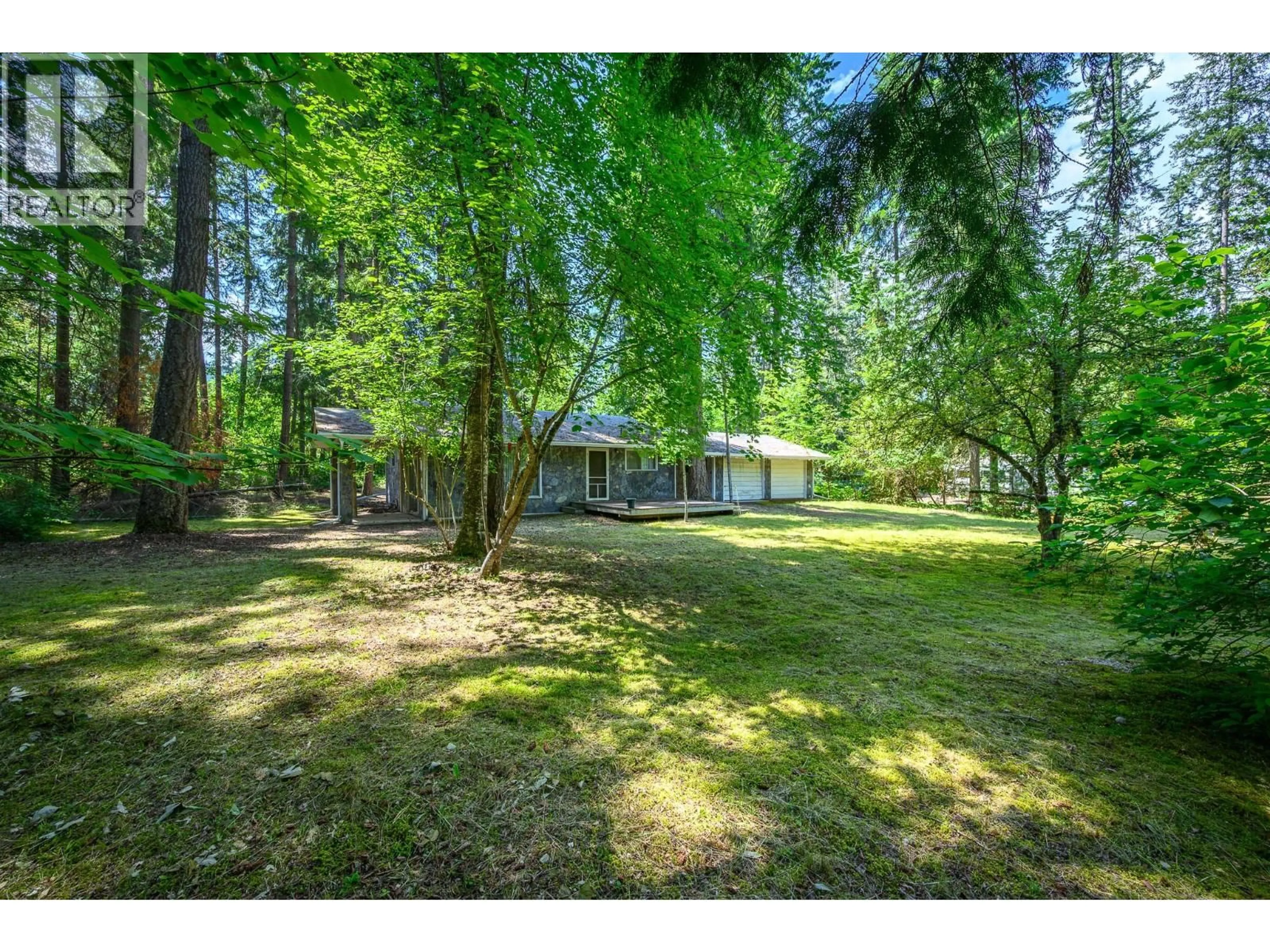 A pic from outside/outdoor area/front of a property/back of a property/a pic from drone, forest/trees view for 710 & 714 WESTMINSTER ROAD, Swansea Point British Columbia V0E2K2