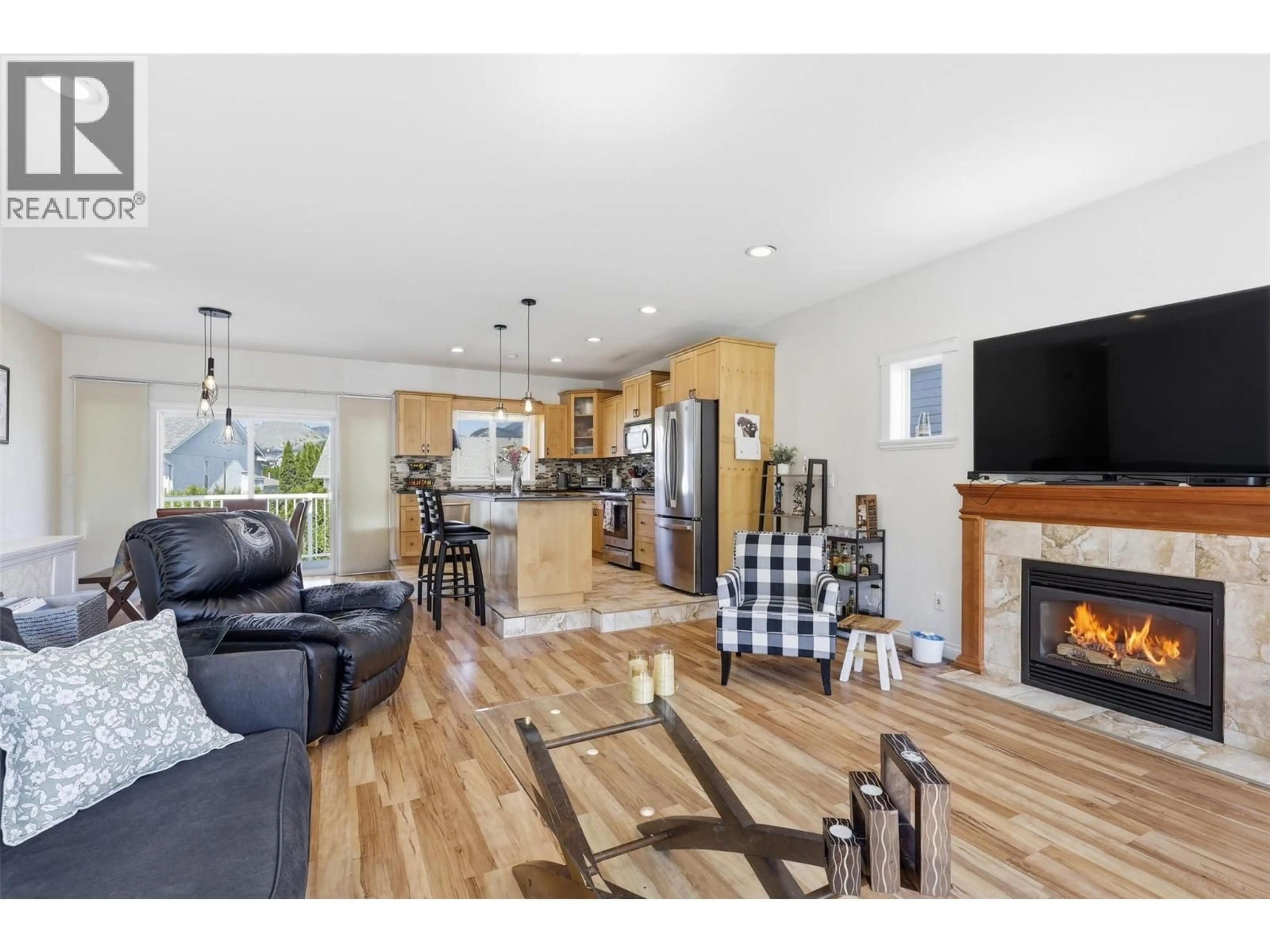 Open concept kitchen, wood/laminate floor for 365 COUGAR ROAD, Kamloops British Columbia V2C6V1