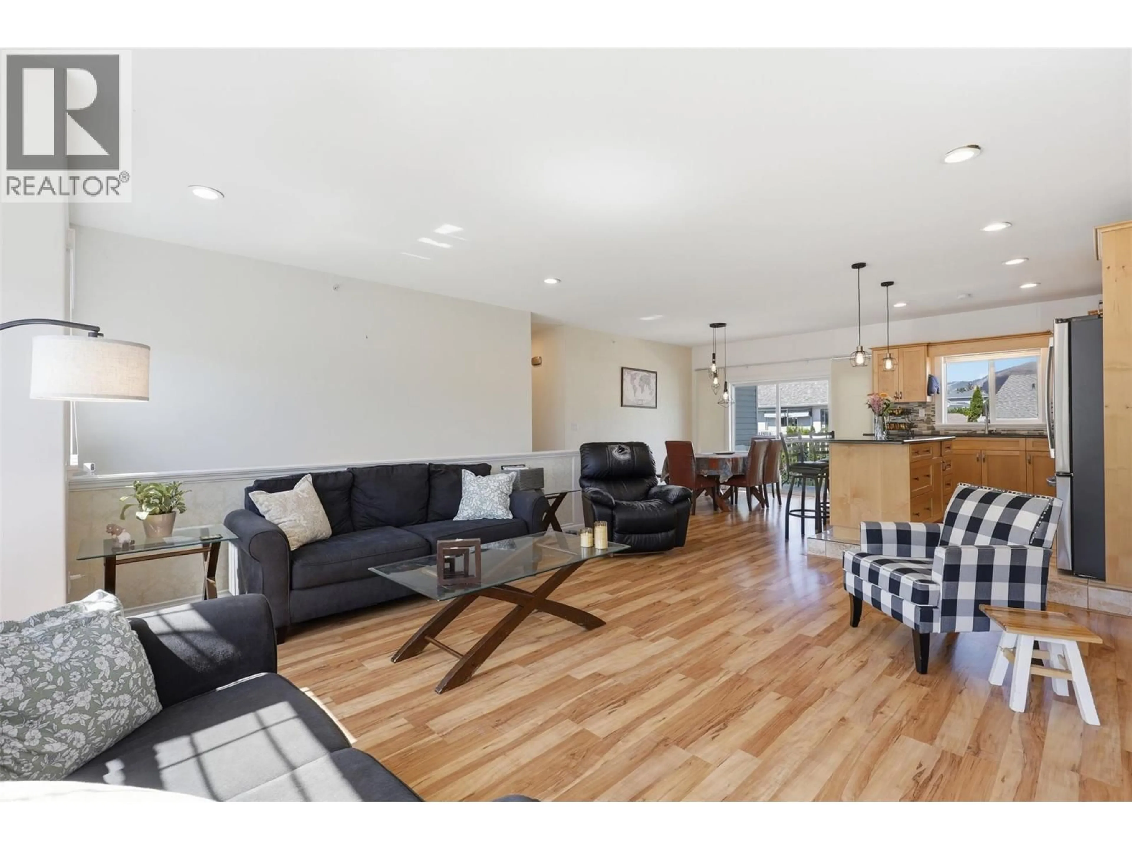Living room with furniture, wood/laminate floor for 365 COUGAR ROAD, Kamloops British Columbia V2C6V1