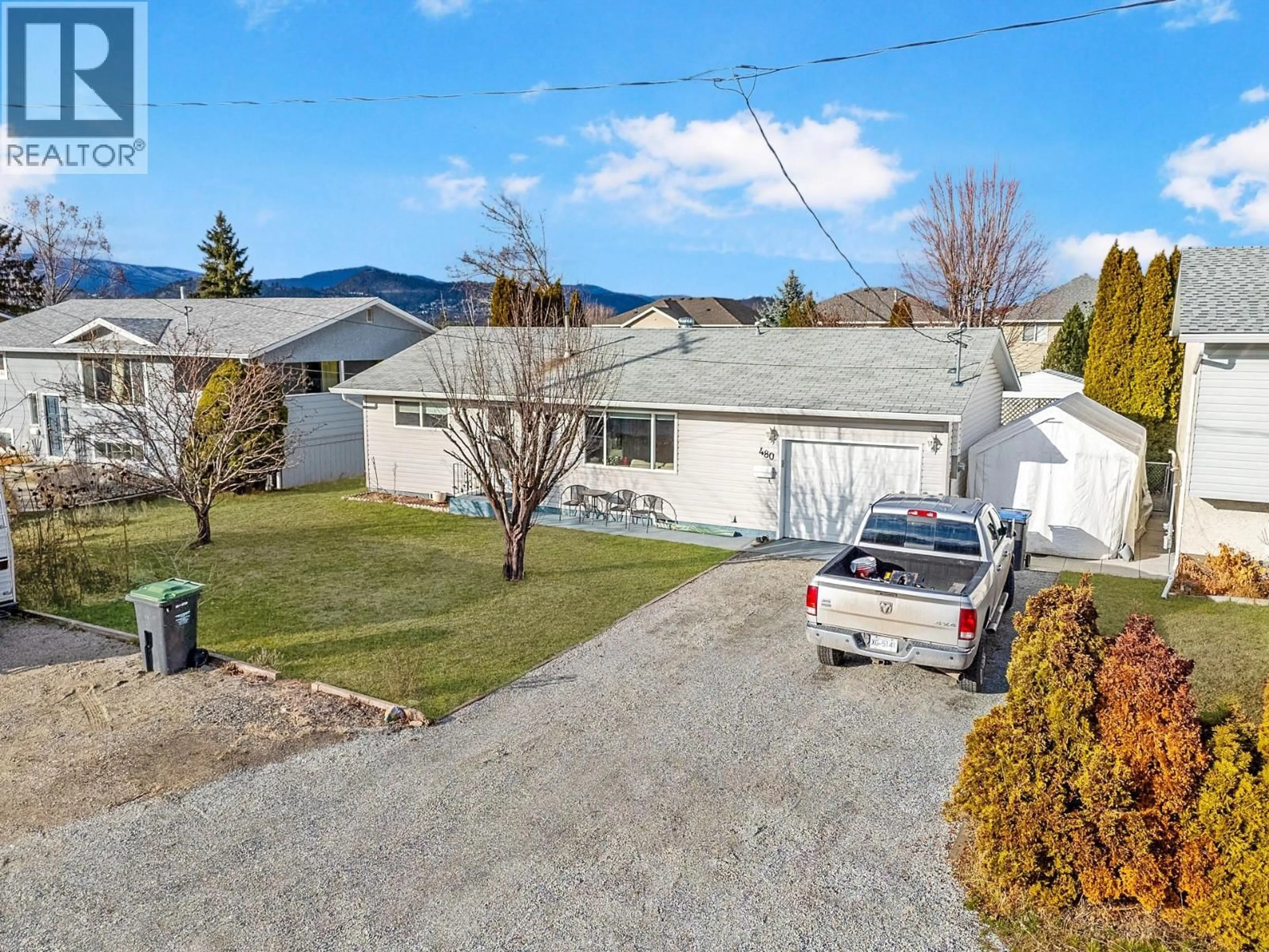A pic from outside/outdoor area/front of a property/back of a property/a pic from drone, street for 480 MONTEREY ROAD, Kelowna British Columbia V1X1A2