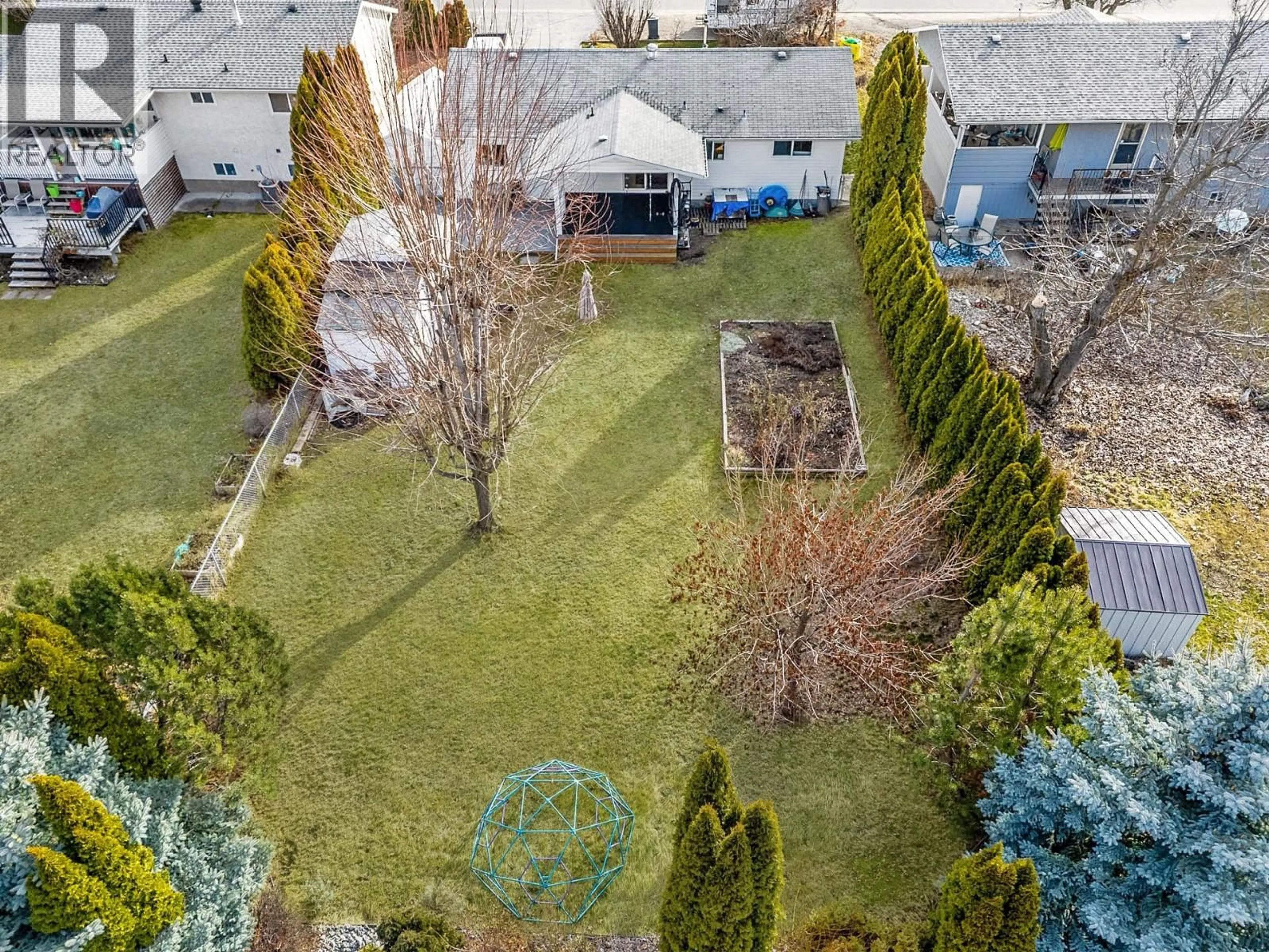 A pic from outside/outdoor area/front of a property/back of a property/a pic from drone, street for 480 MONTEREY ROAD, Kelowna British Columbia V1X1A2