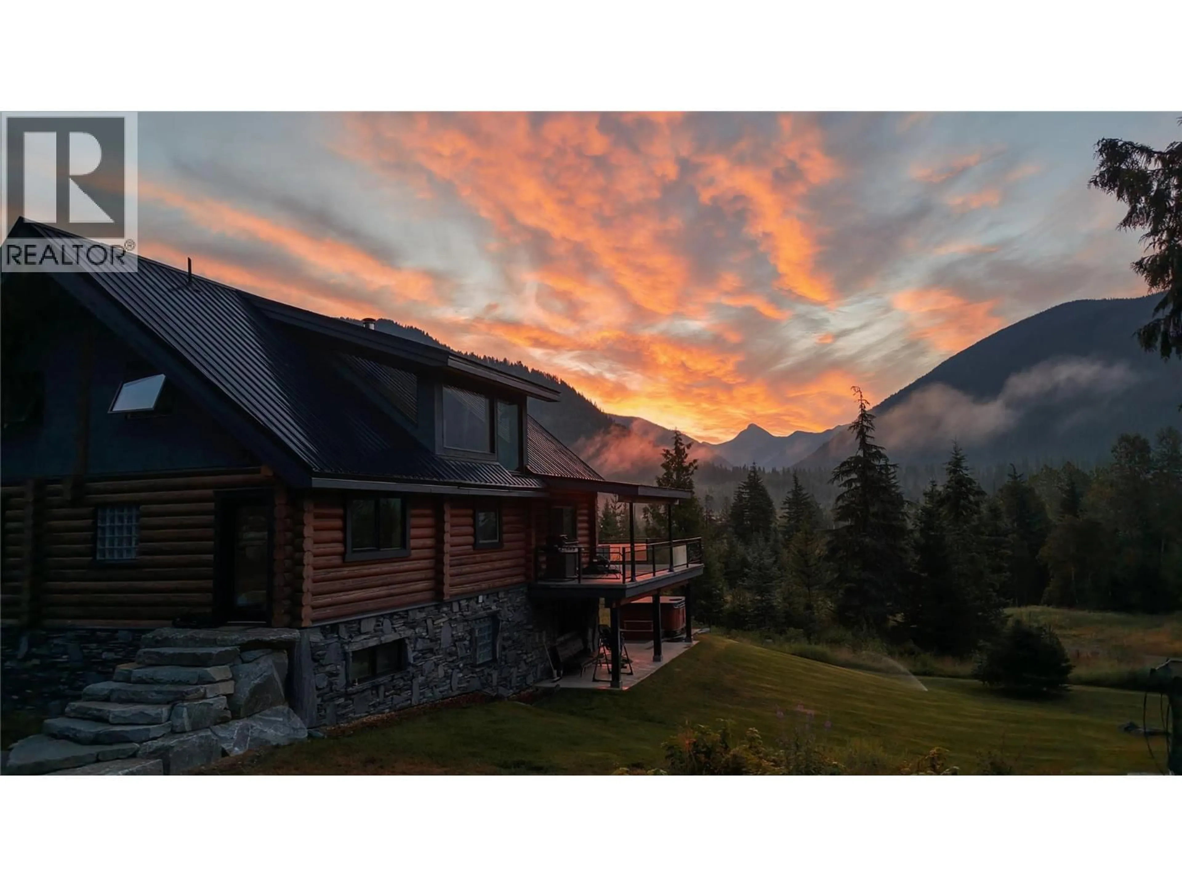 A pic from outside/outdoor area/front of a property/back of a property/a pic from drone, mountain view for 6580 HIGHWAY 6 OTHER, Ymir British Columbia V0G2K0