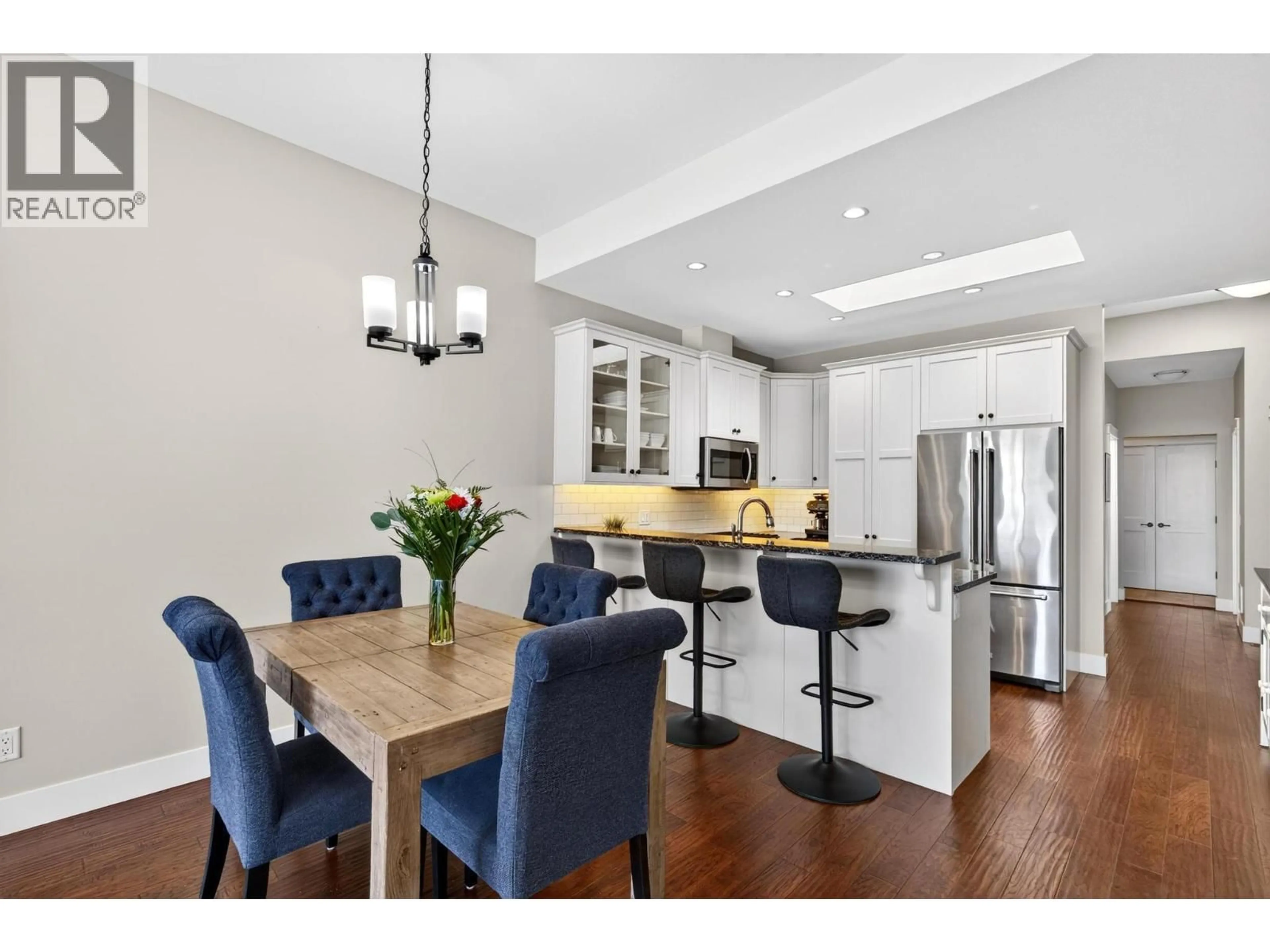 Open concept kitchen, wood/laminate floor for 1704 LAKE VISTA ROAD, West Kelowna British Columbia V1Z4E1