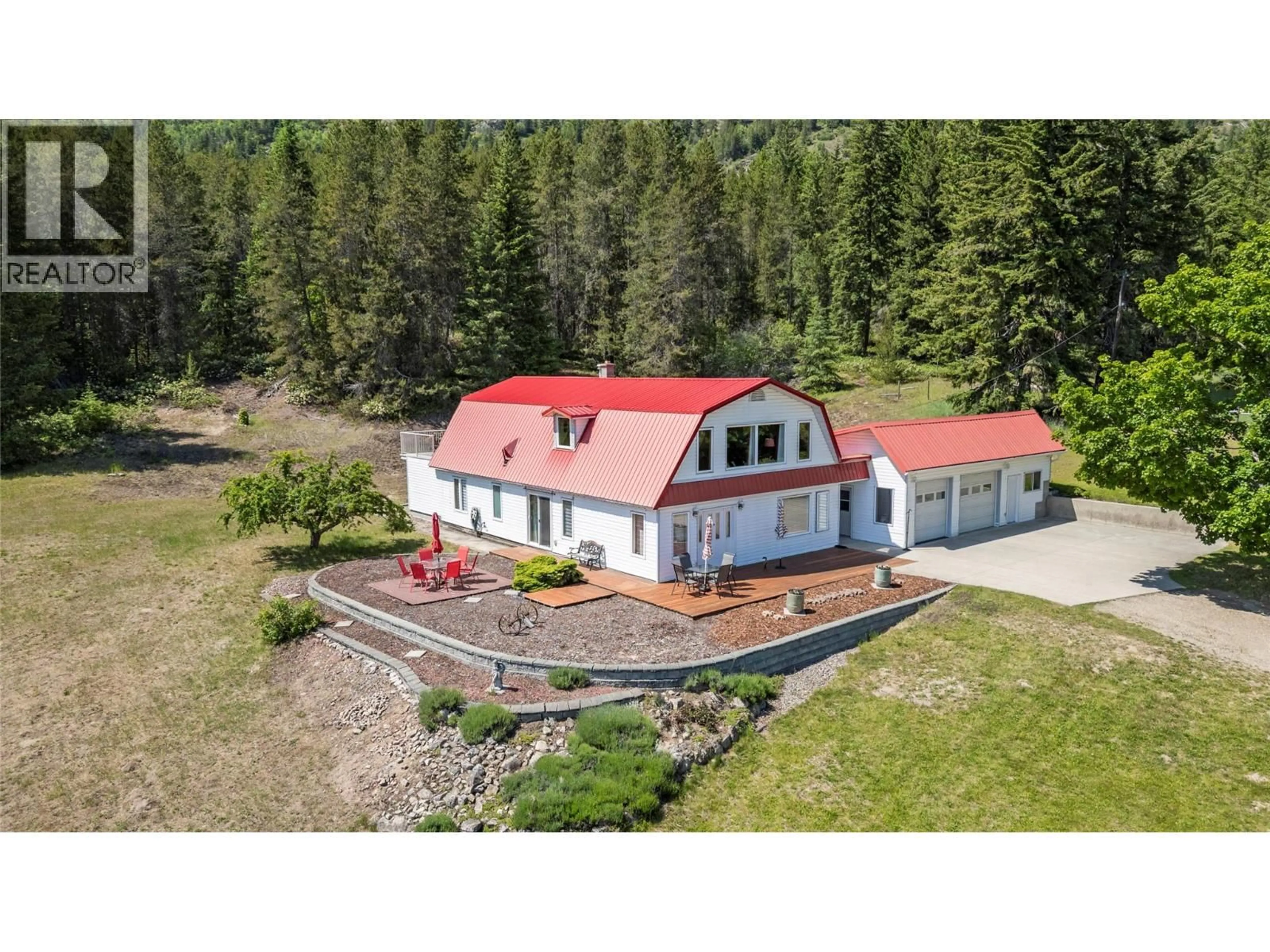 A pic from outside/outdoor area/front of a property/back of a property/a pic from drone, building for 5641 50 STREET NORTHWEST, Salmon Arm British Columbia V1E3A6