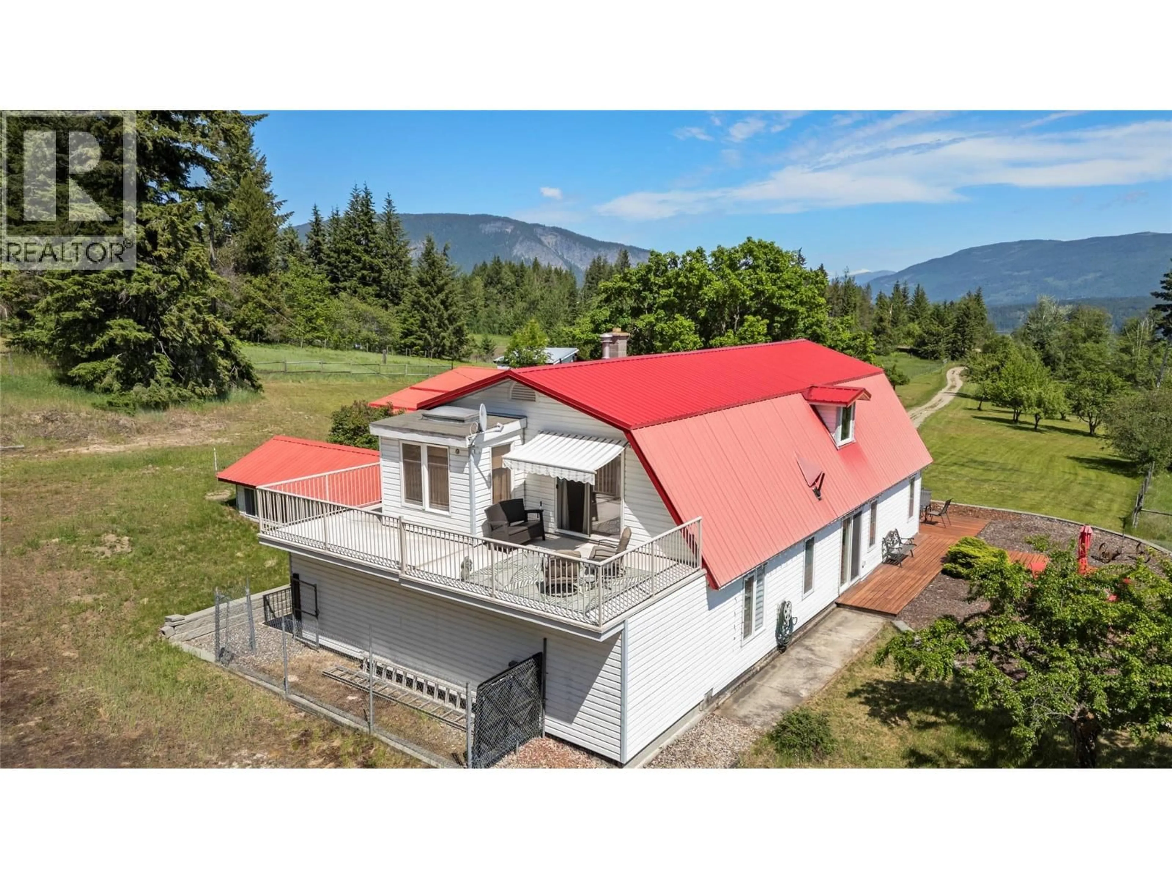 A pic from outside/outdoor area/front of a property/back of a property/a pic from drone, mountain view for 5641 50 STREET NORTHWEST, Salmon Arm British Columbia V1E3A6