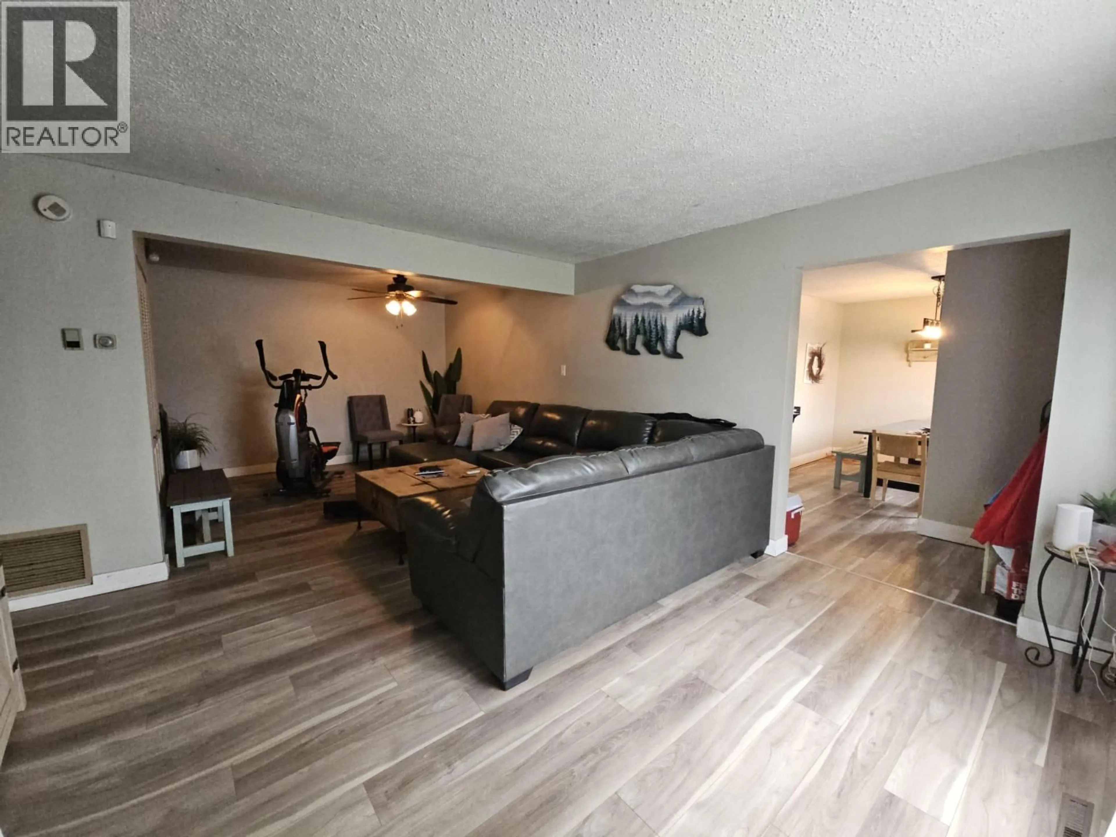 Living room with furniture, unknown for 4704 50 AVENUE NORTHEAST, Chetwynd British Columbia V0C1J0