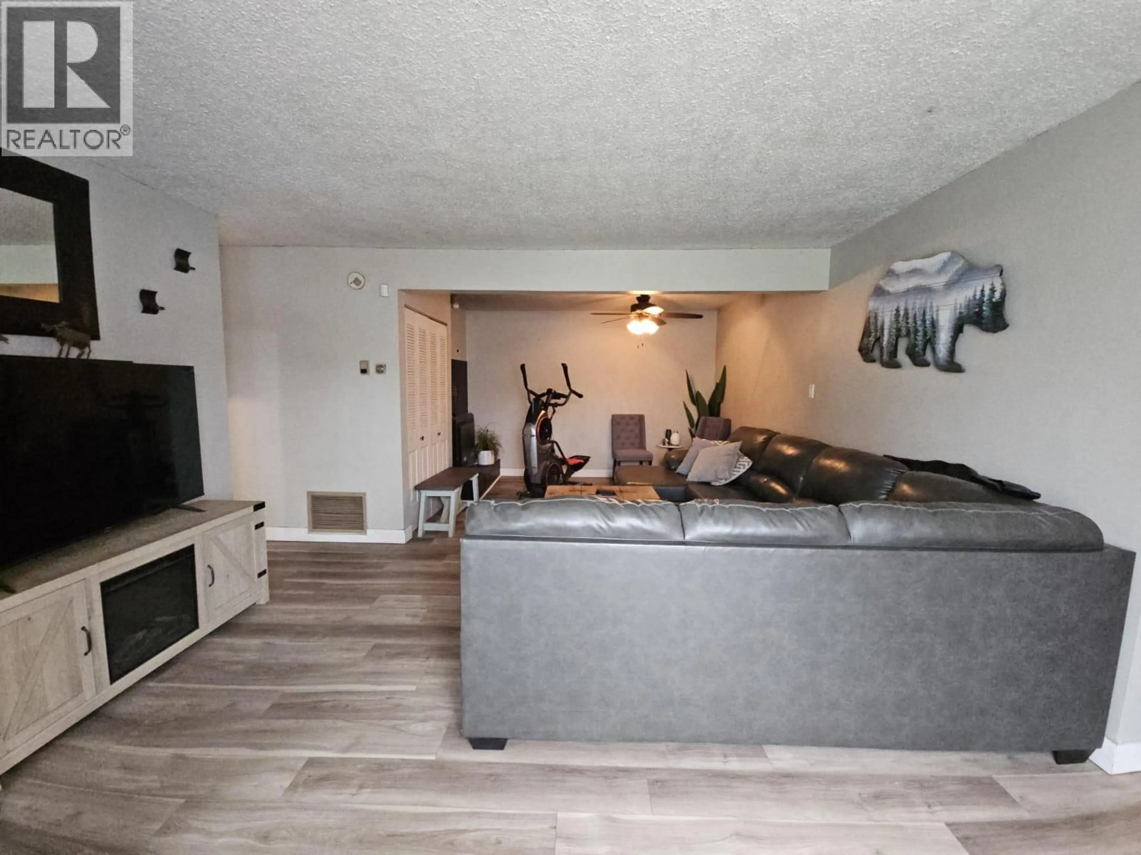 Living room with furniture, unknown for 4704 50 AVENUE NORTHEAST, Chetwynd British Columbia V0C1J0