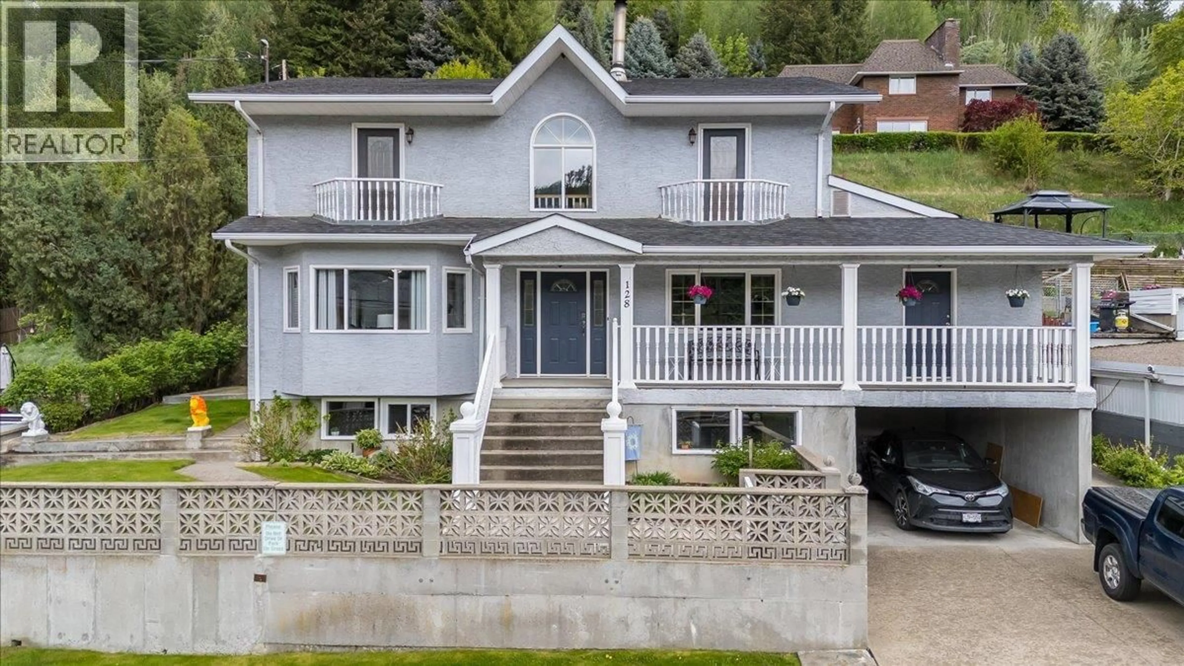 Home with vinyl exterior material, street for 128 COLLEY STREET, Warfield British Columbia V1R2M2