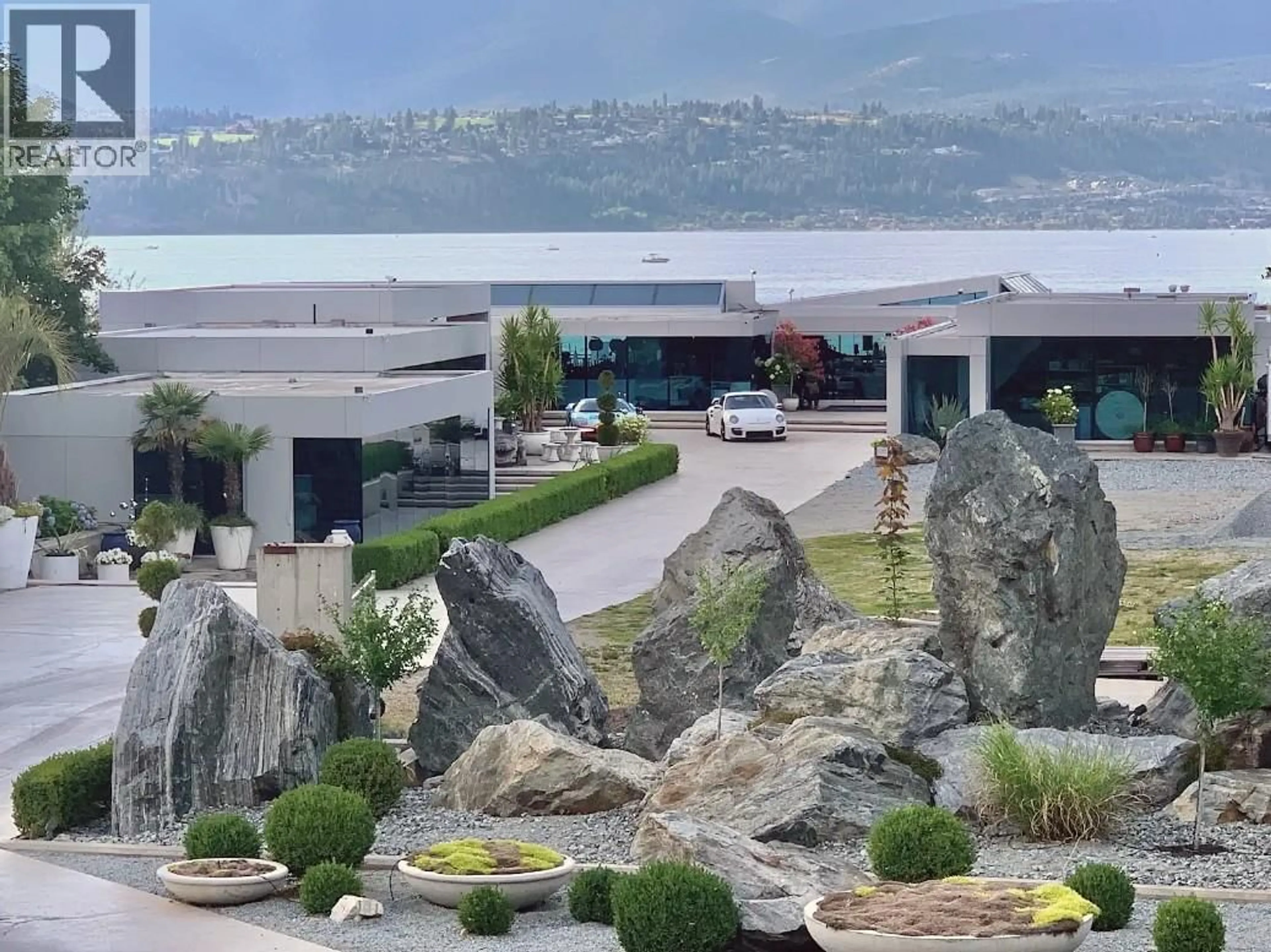 A pic from outside/outdoor area/front of a property/back of a property/a pic from drone, mountain view for 4358 HOBSON ROAD, Kelowna British Columbia V1W1Y3
