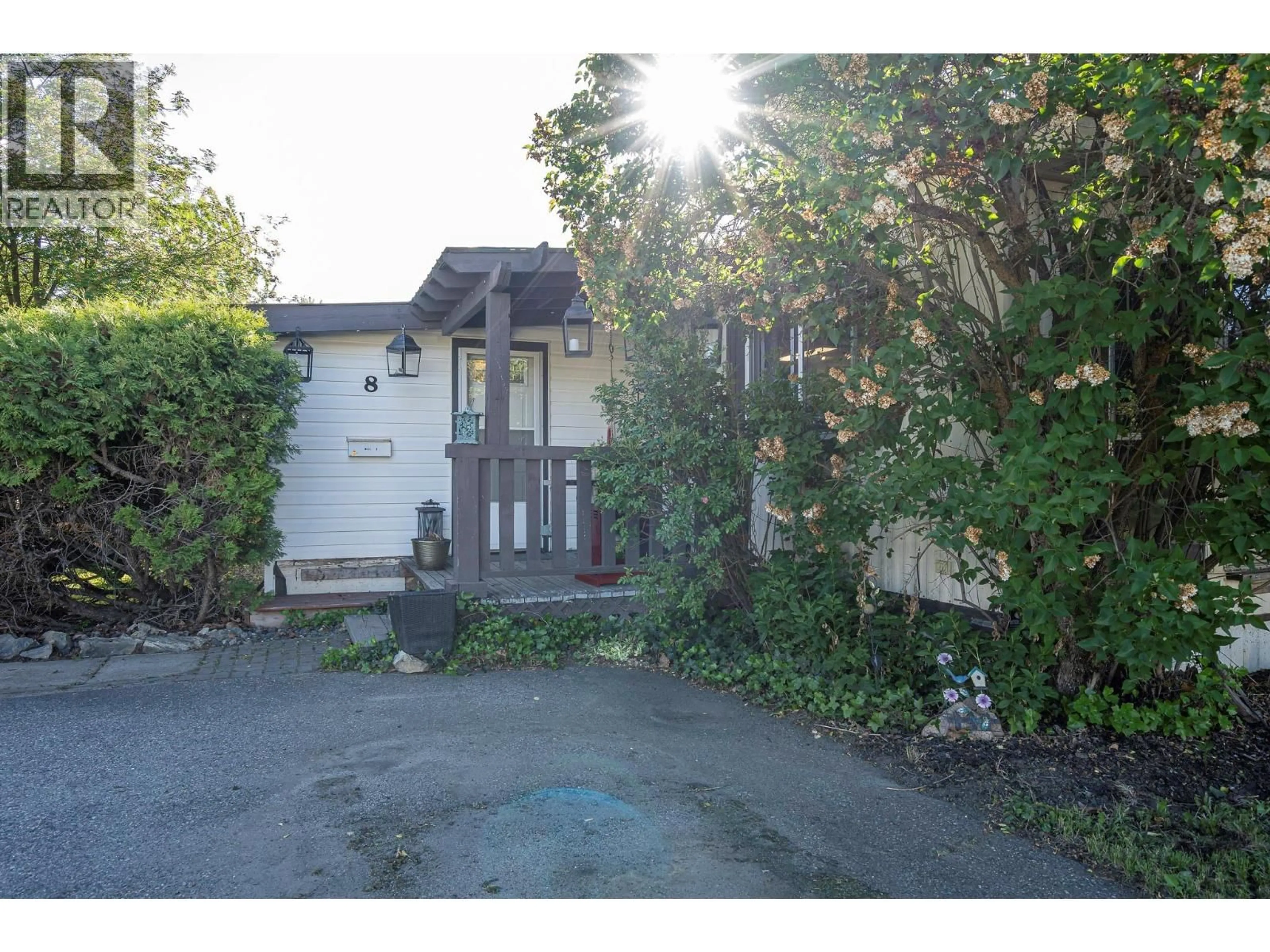A pic from outside/outdoor area/front of a property/back of a property/a pic from drone, street for 8 - 720 COMMONWEALTH ROAD, Lake Country British Columbia V4V1R5