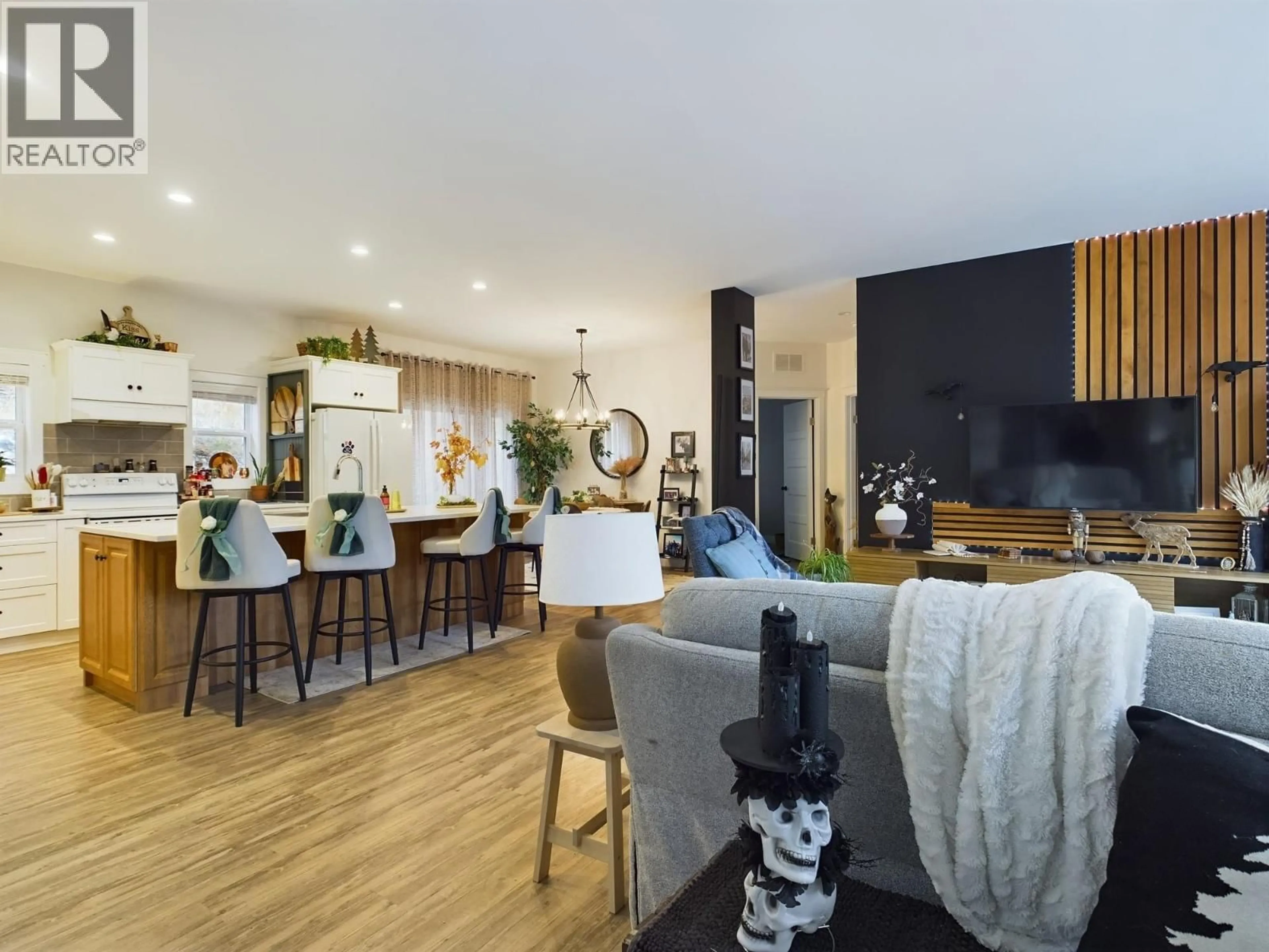 Open concept kitchen, wood/laminate floor for 1020 BULLMOOSE WAY, Osoyoos British Columbia V0H1V6