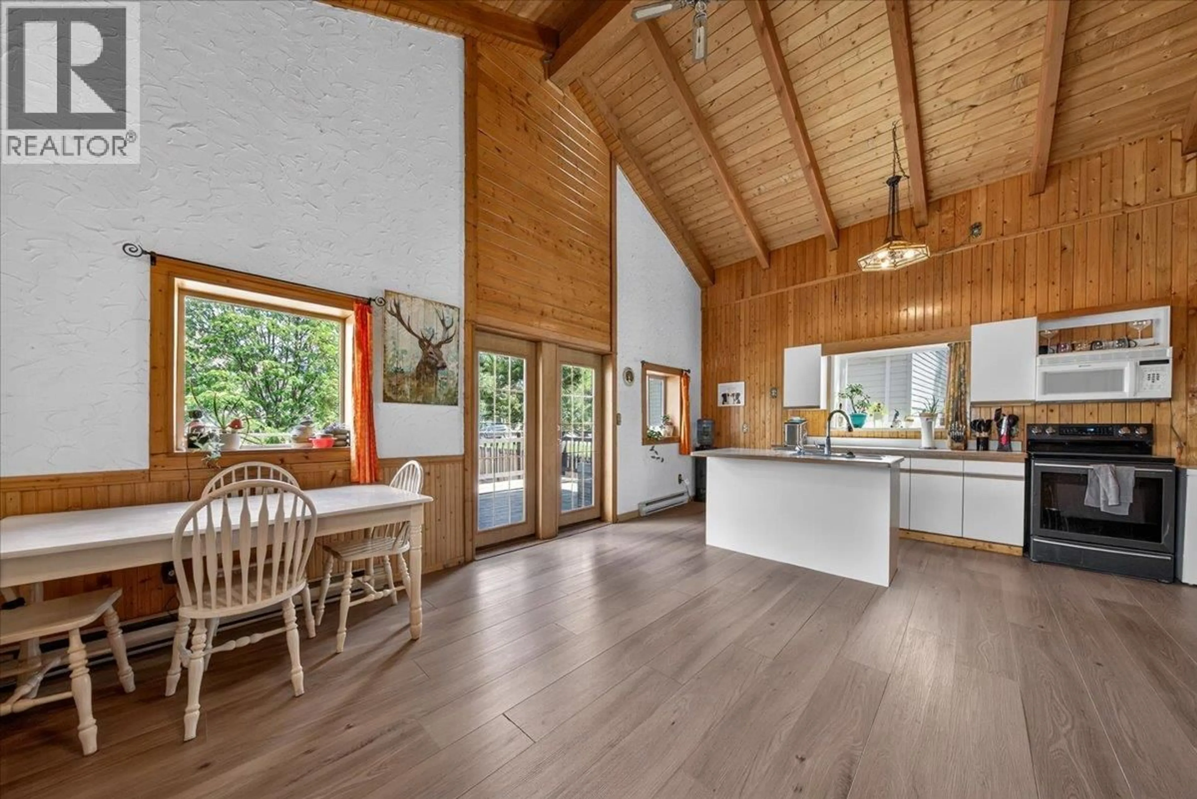 Open concept kitchen, wood/laminate floor for 4764 FORSTERS LANDING ROAD, Radium Hot Springs British Columbia V0A1M0