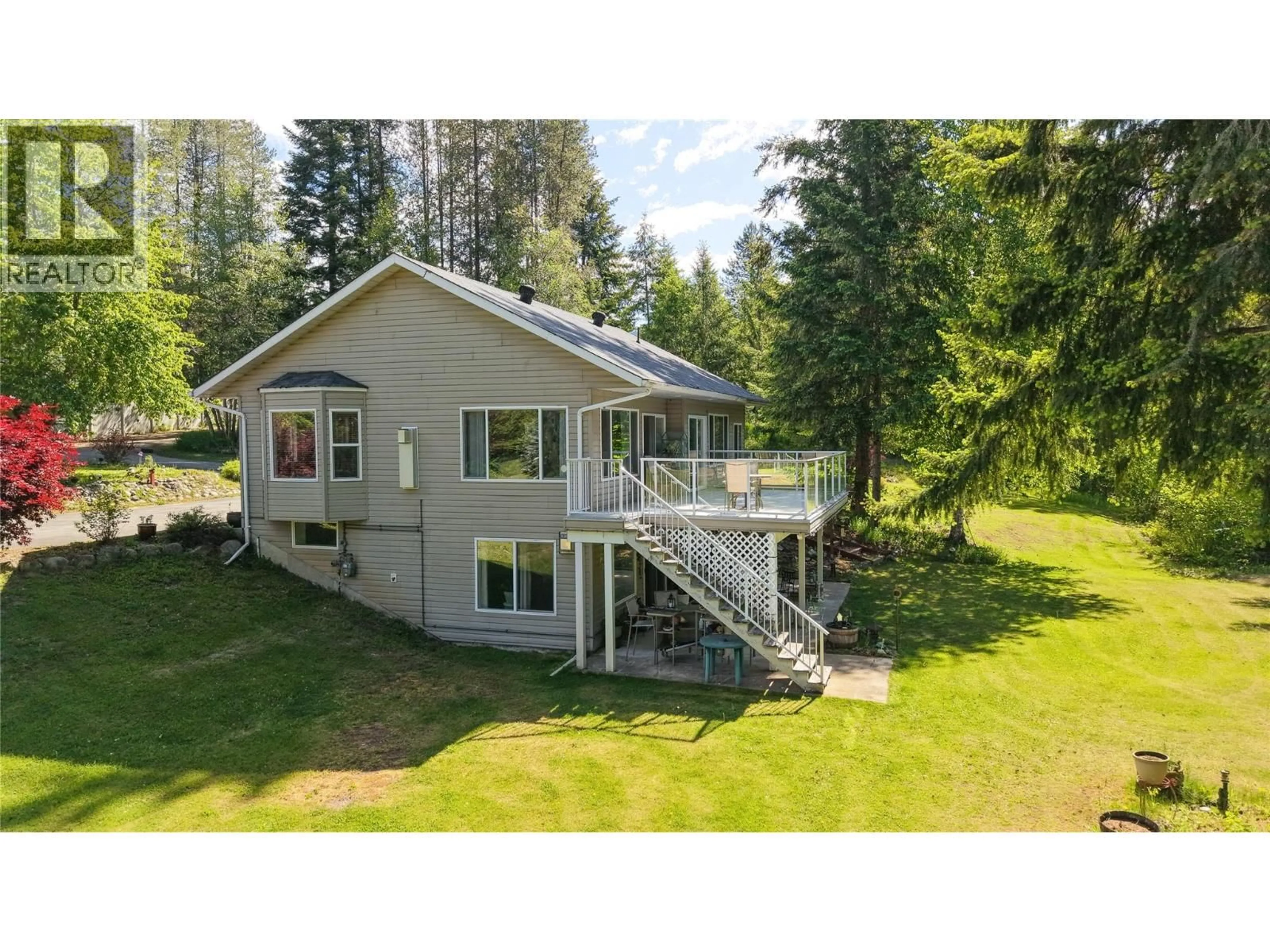 A pic from outside/outdoor area/front of a property/back of a property/a pic from drone, water/lake/river/ocean view for 2693 OSACHOFF ROAD, South Slocan British Columbia V1N4P4