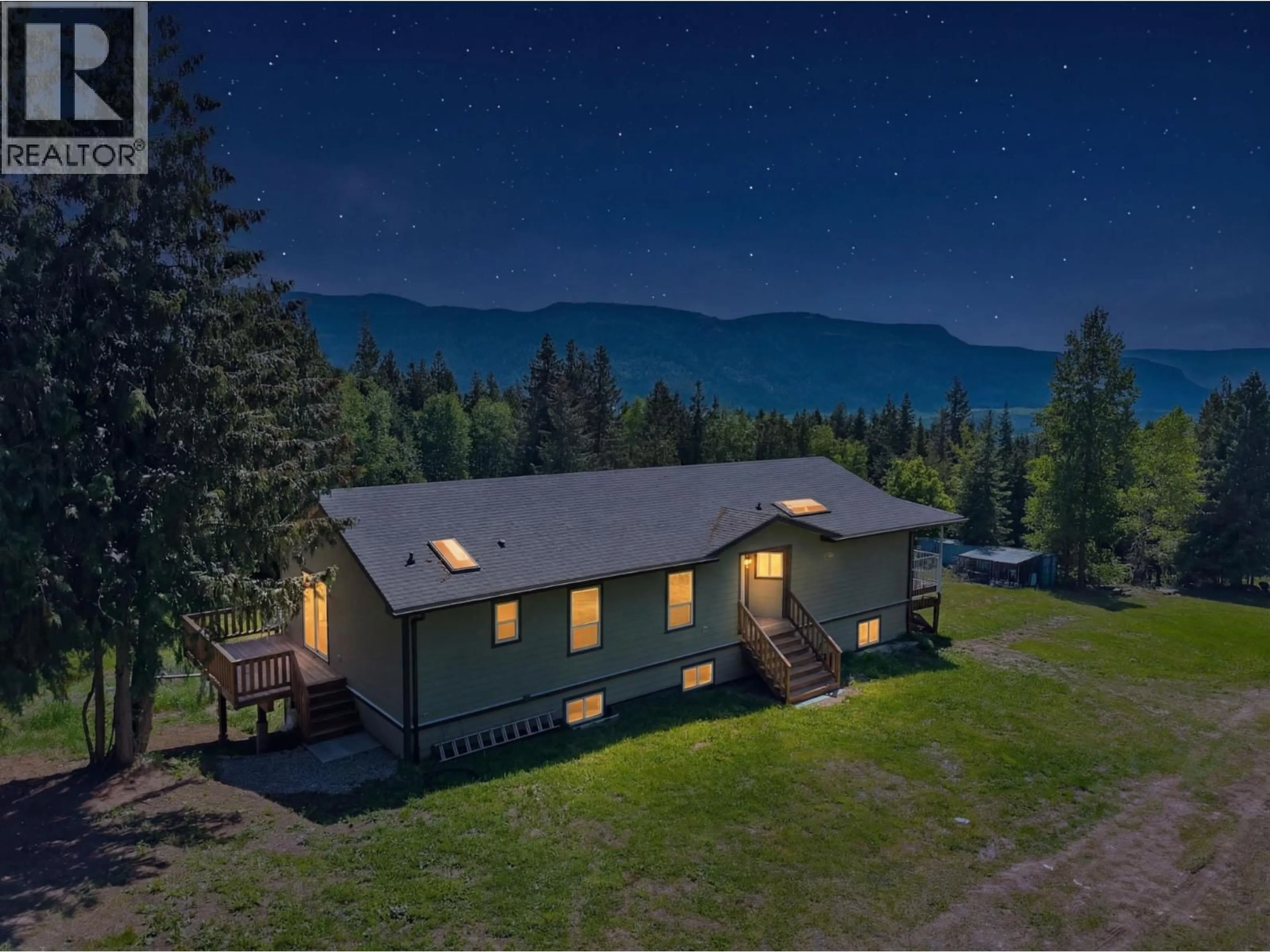 A pic from outside/outdoor area/front of a property/back of a property/a pic from drone, mountain view for 31 VIOLET ROAD, Grindrod British Columbia V0E1Y0