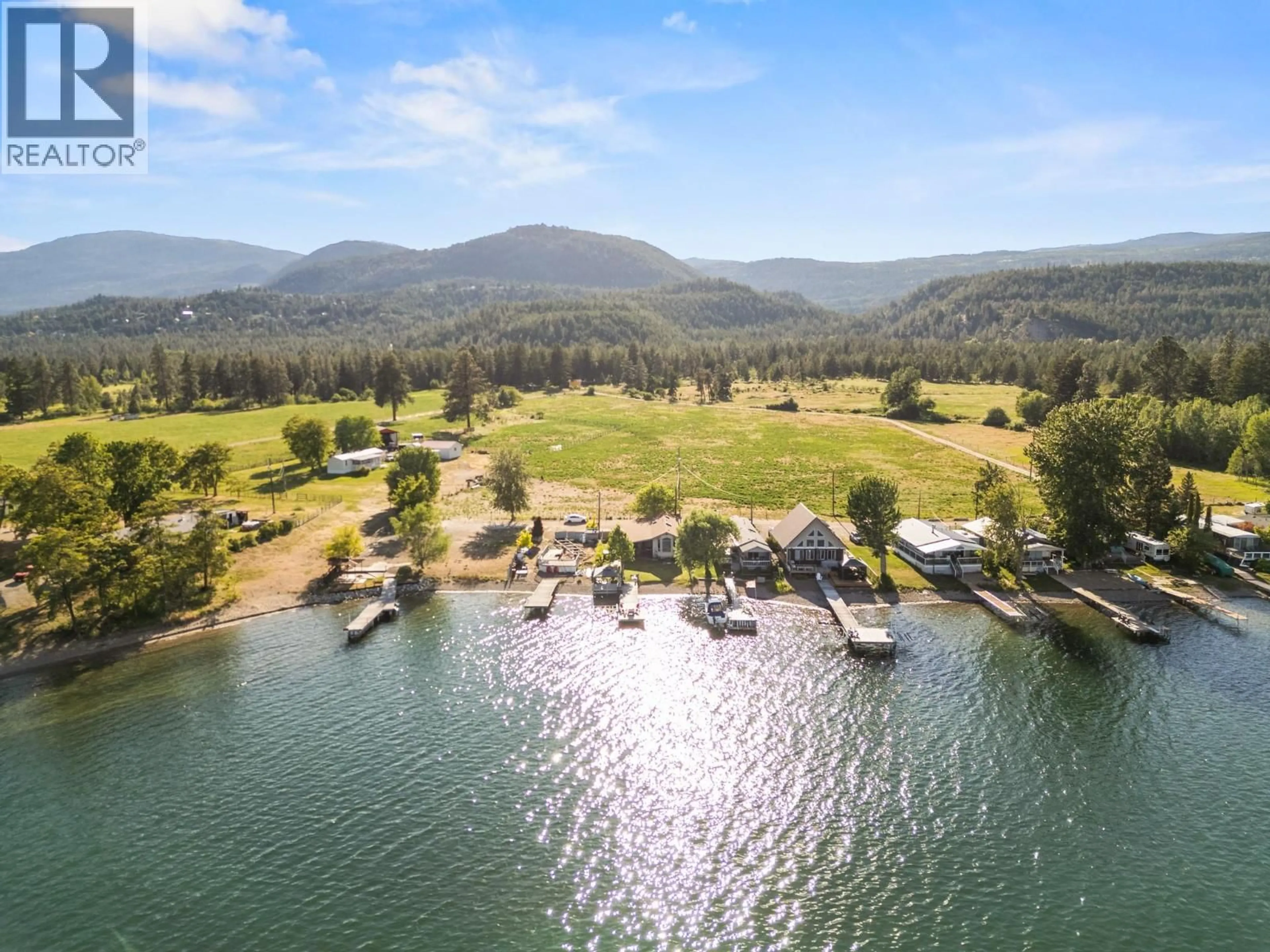 A pic from outside/outdoor area/front of a property/back of a property/a pic from drone, water/lake/river/ocean view for 19 KI LOW NA ROAD, Vernon British Columbia V1H2h3