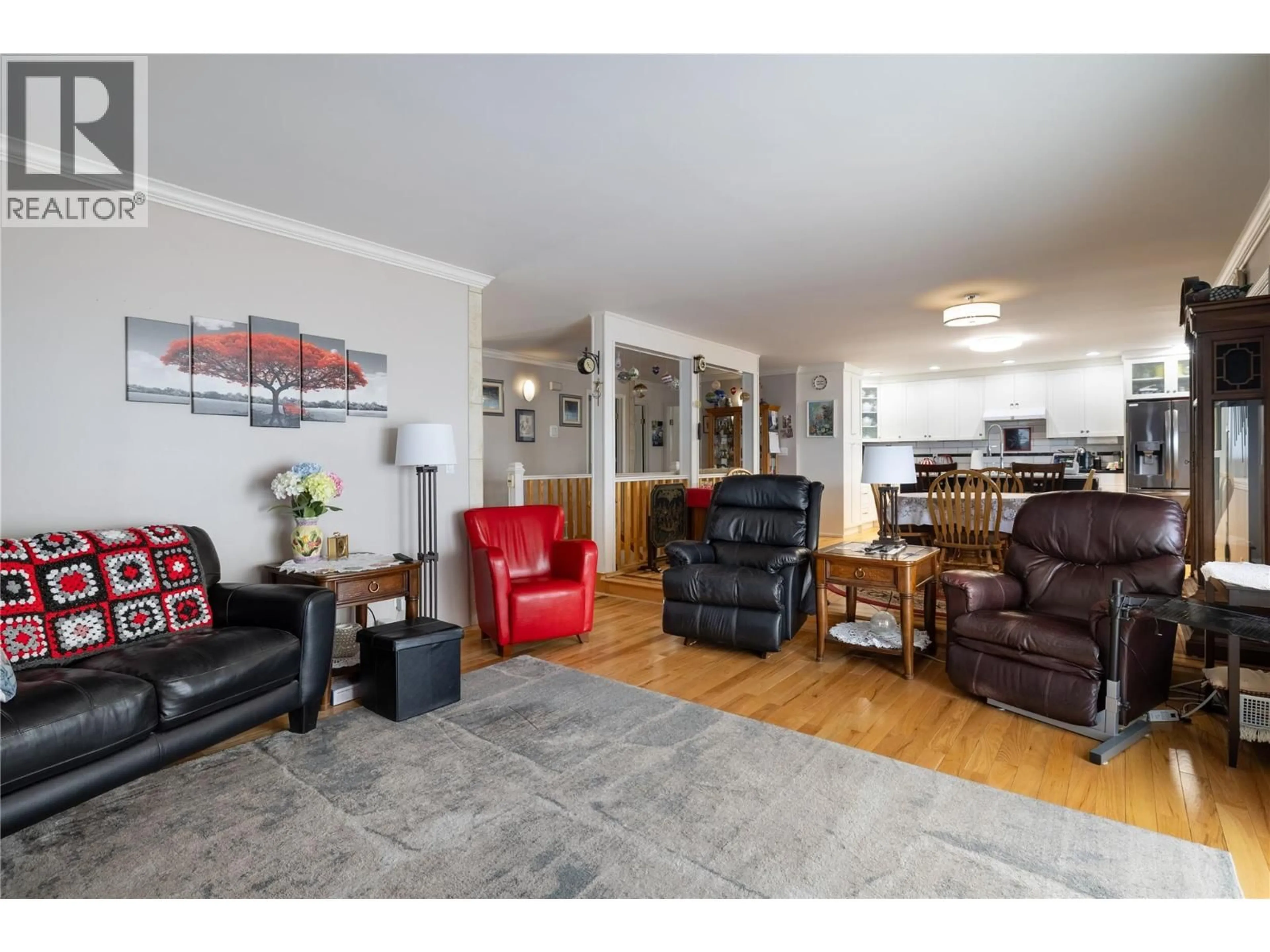 Living room with furniture, wood/laminate floor for 3944 CASCADE DRIVE, Vernon British Columbia V1T9E7