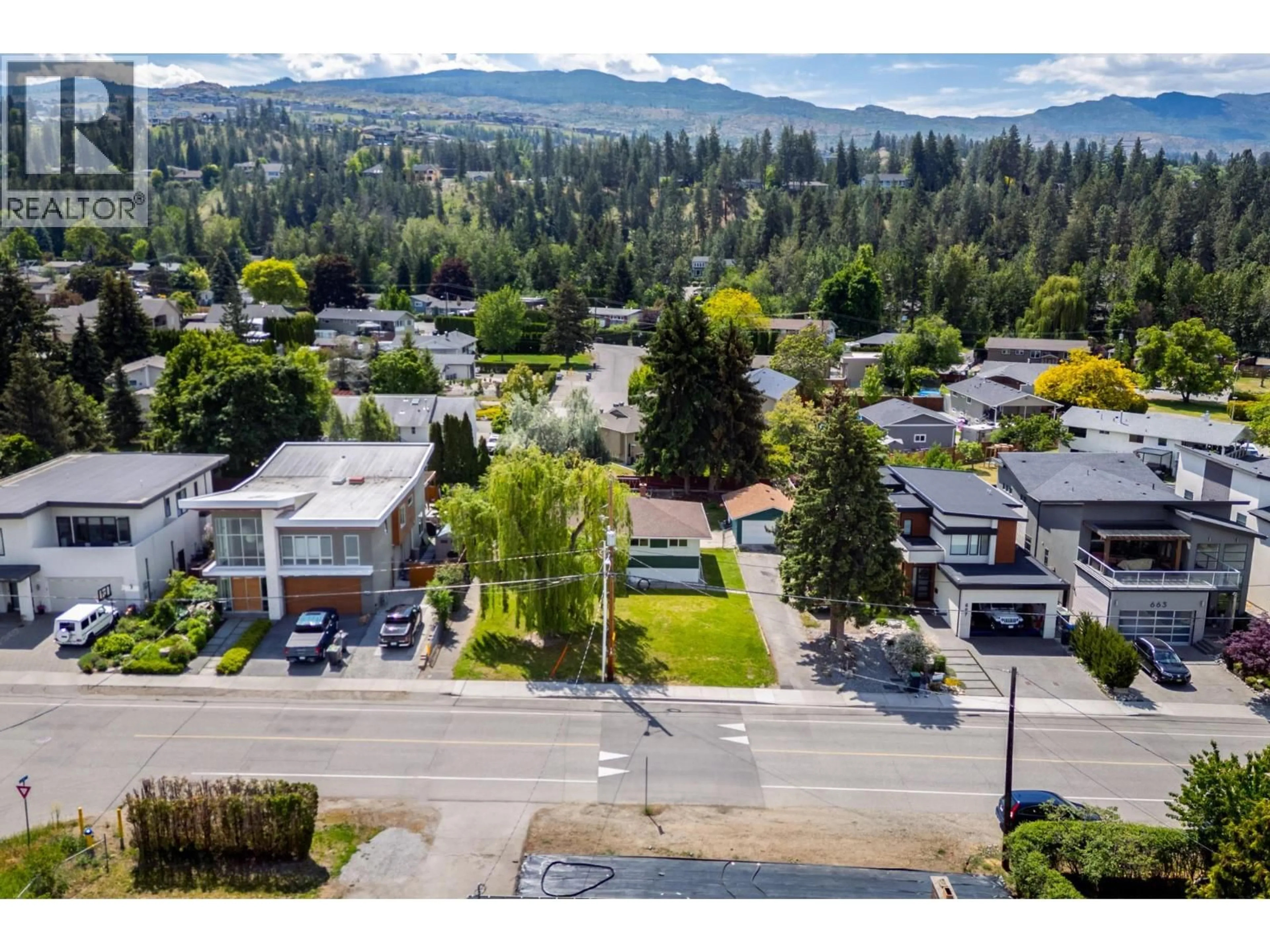 A pic from outside/outdoor area/front of a property/back of a property/a pic from drone, mountain view for 679 MCCLURE ROAD, Kelowna British Columbia V1W1L7