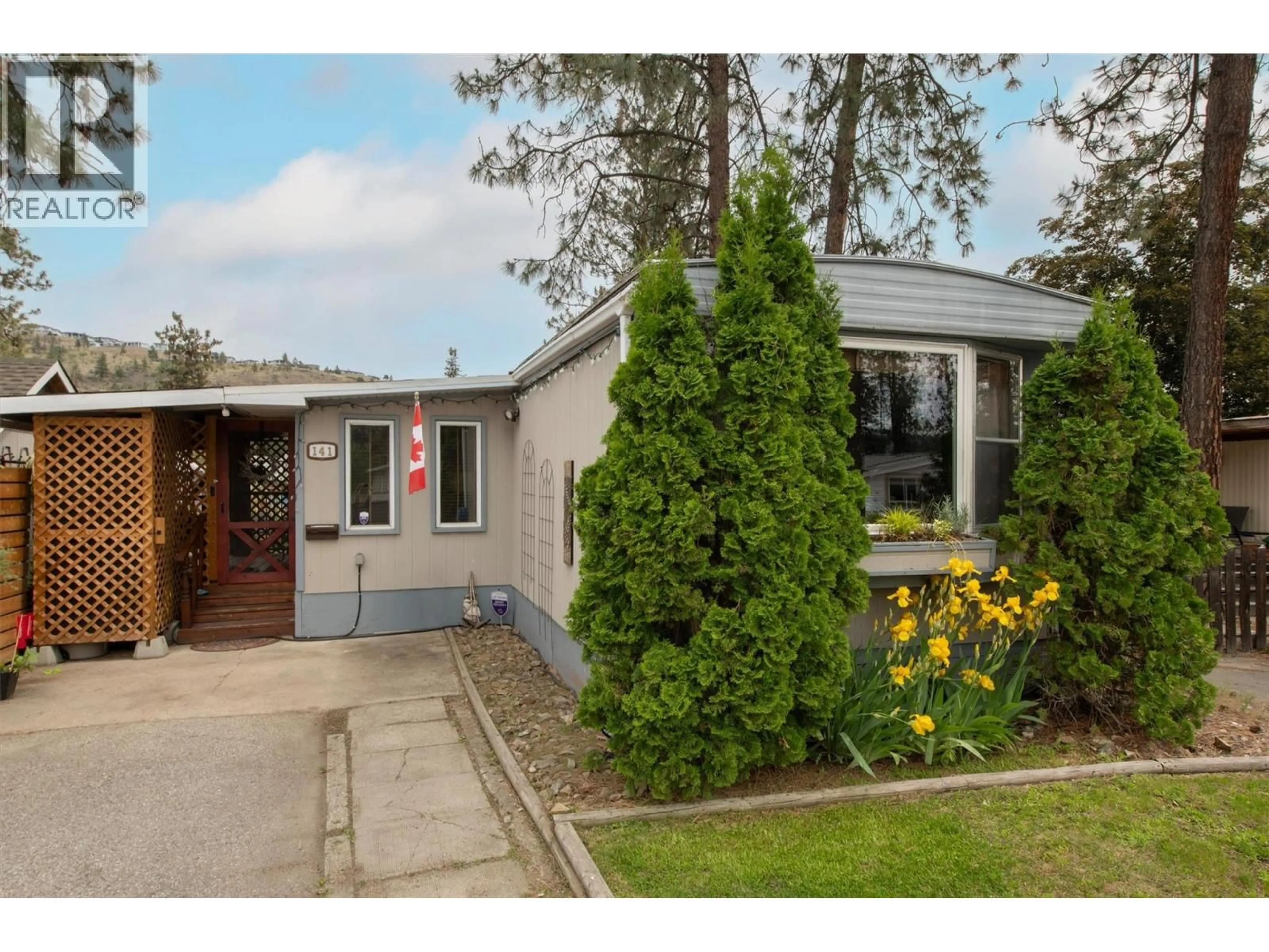 Home with vinyl exterior material, street for 141 - 1999 HIGHWAY 97 HIGHWAY SOUTH, West Kelowna British Columbia V1Z1B2