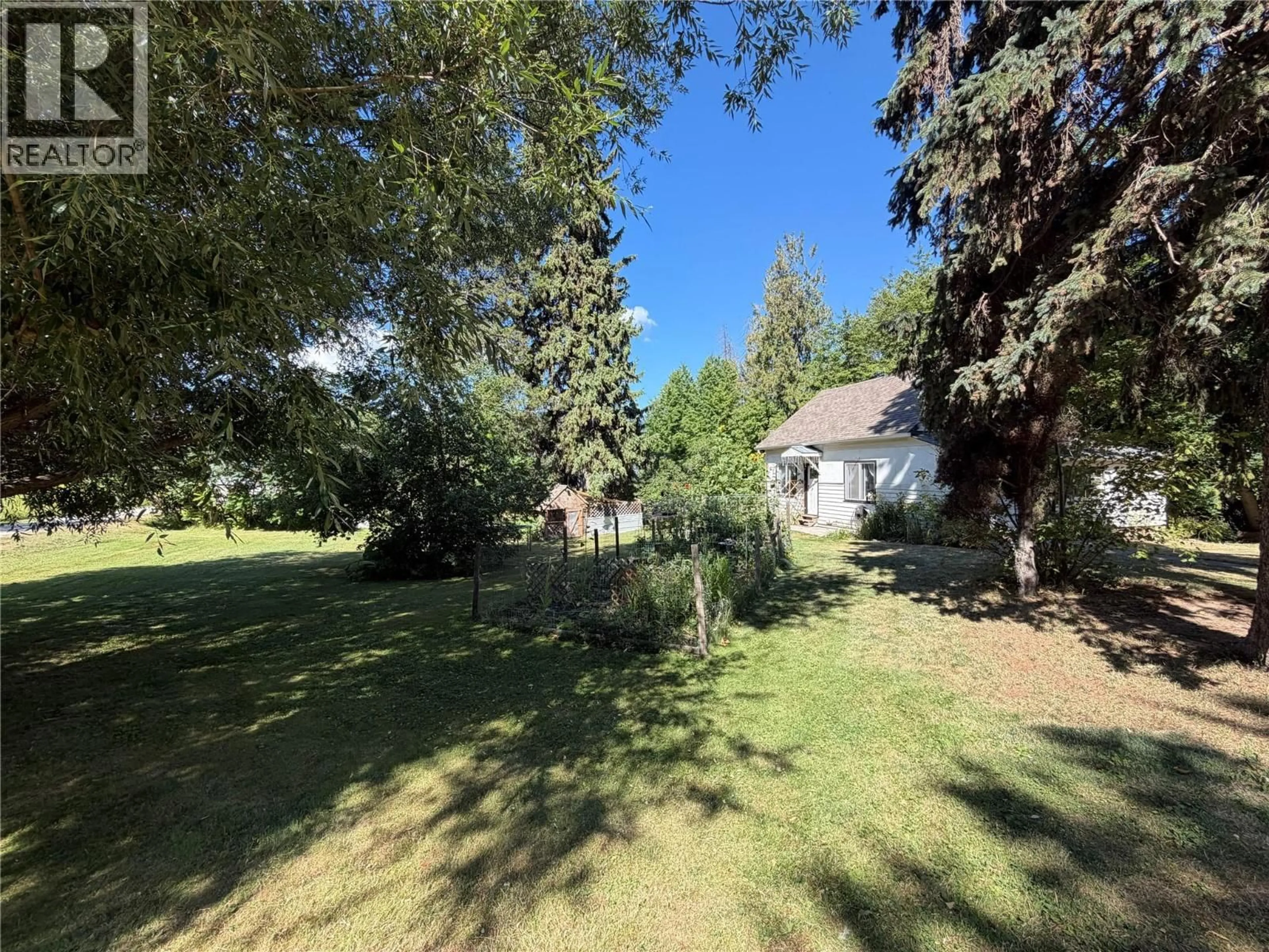 A pic from outside/outdoor area/front of a property/back of a property/a pic from drone, forest/trees view for 2370 LAKESHORE ROAD NORTHEAST, Salmon Arm British Columbia V1E3X9