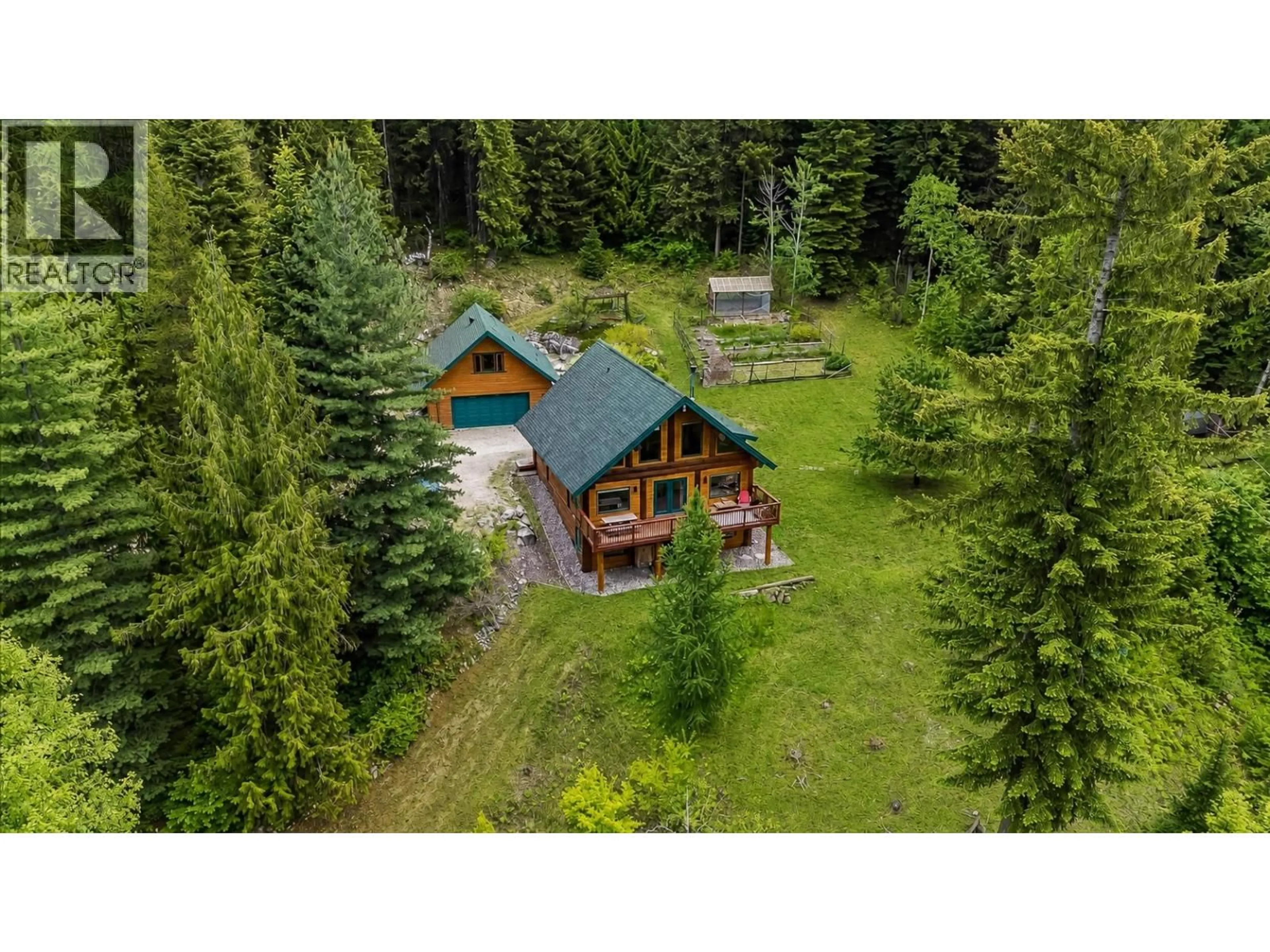 A pic from outside/outdoor area/front of a property/back of a property/a pic from drone, forest/trees view for 1990 6 HIGHWAY, Crescent Valley British Columbia V0G1H0