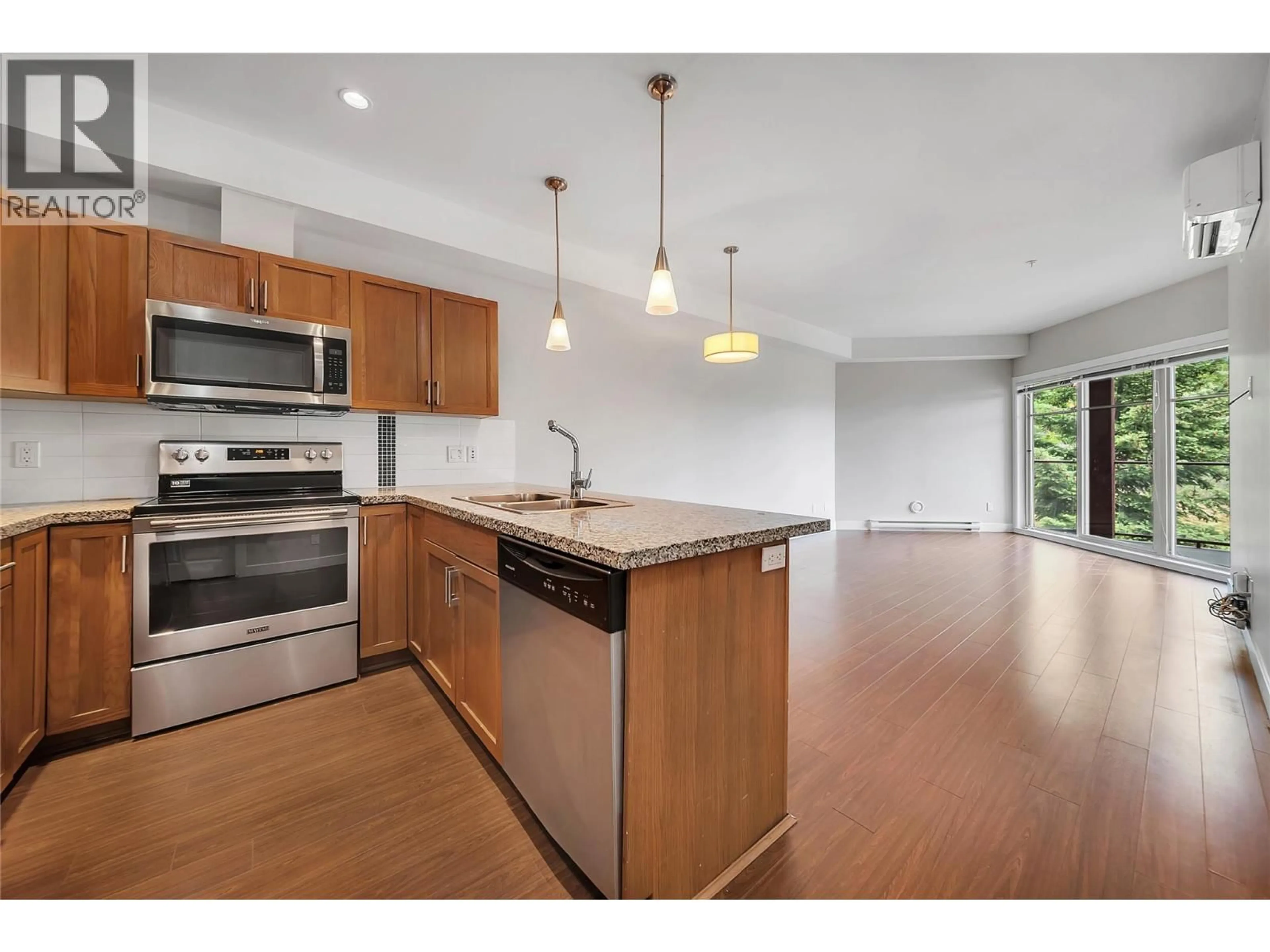 Open concept kitchen, wood/laminate floor for 306 - 3229 SKYVIEW LANE, West Kelowna British Columbia V4T3J3