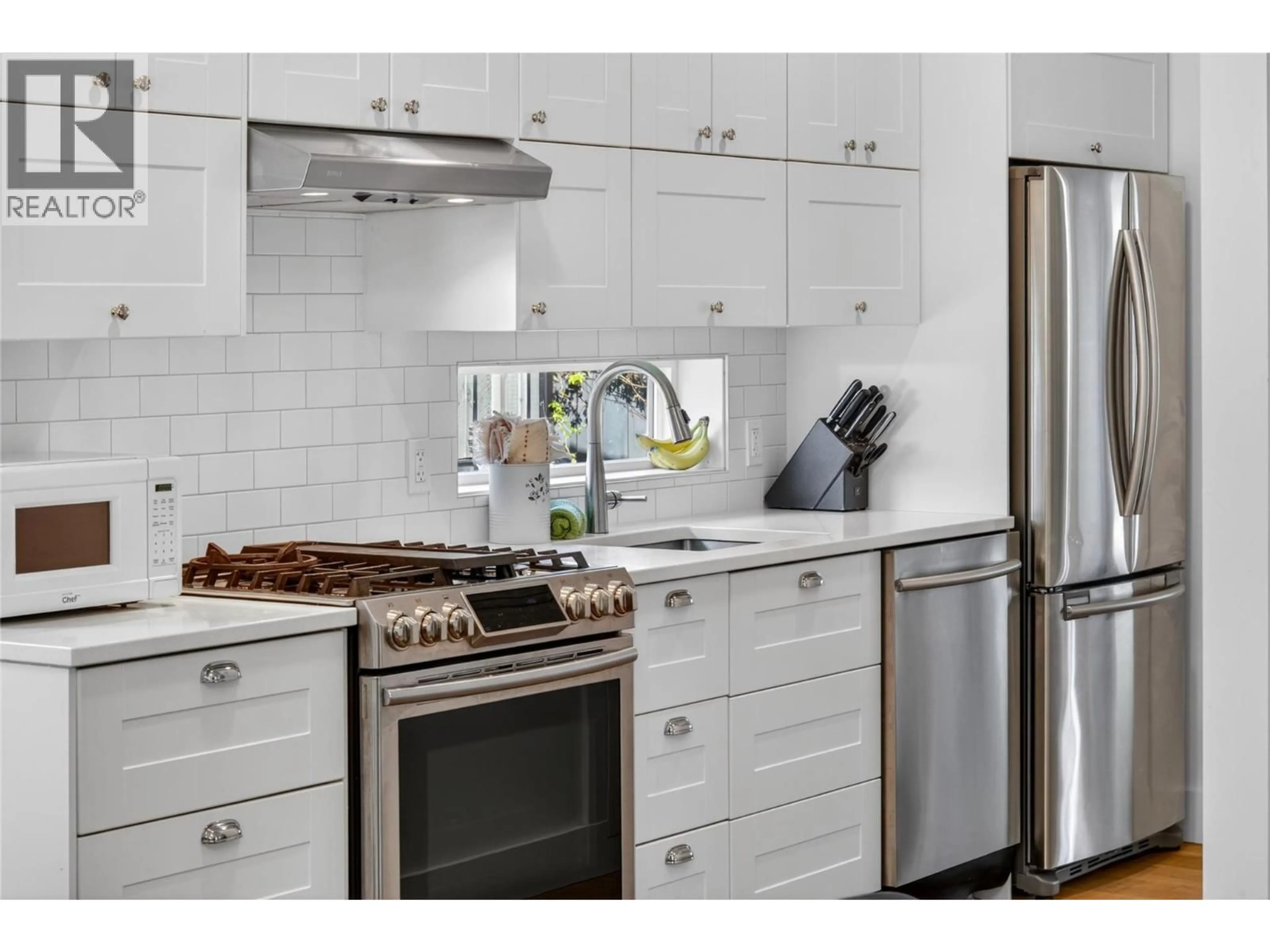 Contemporary kitchen, ceramic/tile floor for 461 6TH AVENUE, Fernie British Columbia V0B1M0