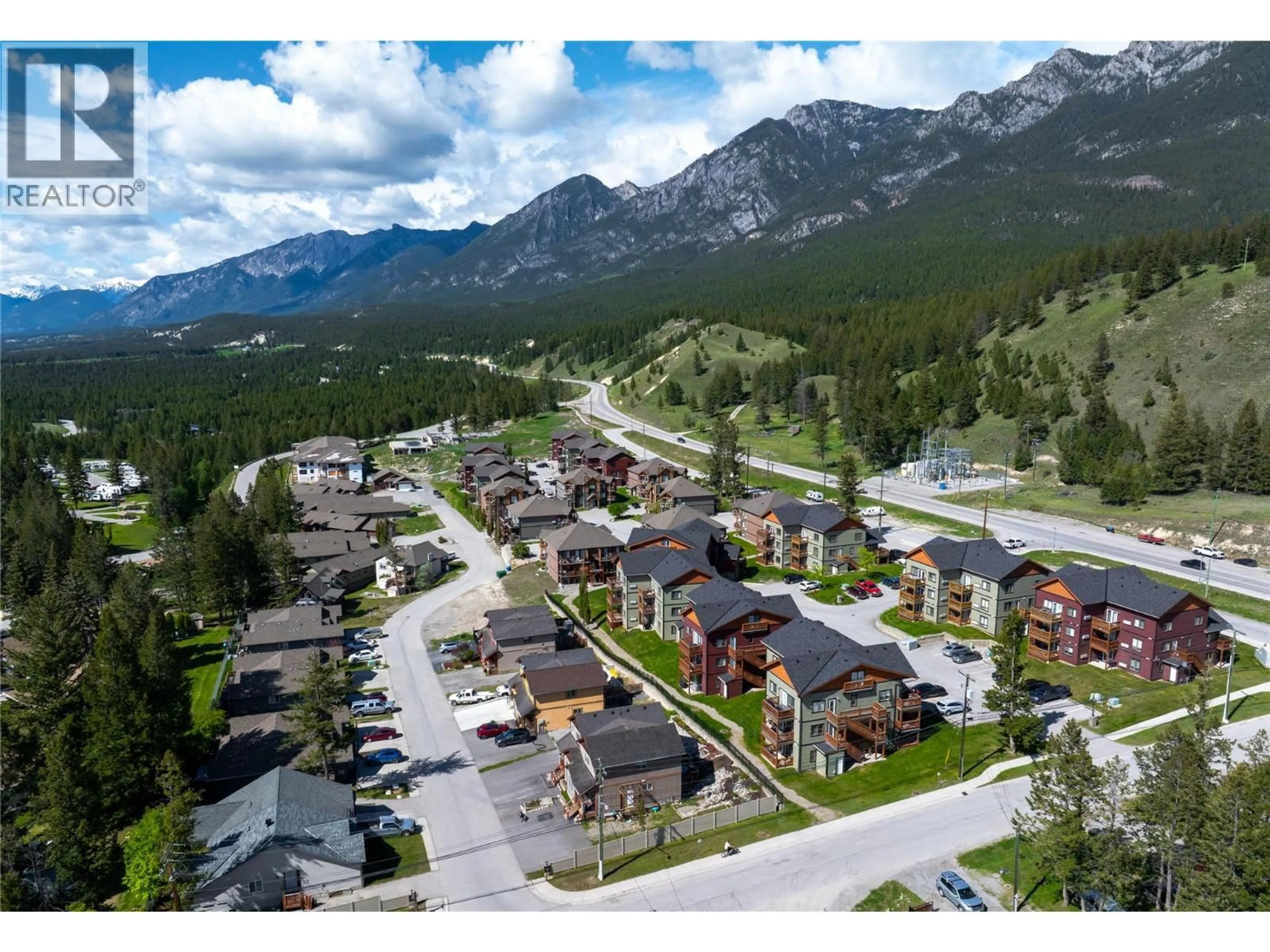 A pic from outside/outdoor area/front of a property/back of a property/a pic from drone, mountain view for 501 - 7337 PROSPECTOR AVENUE, Radium Hot Springs British Columbia V0A1M0