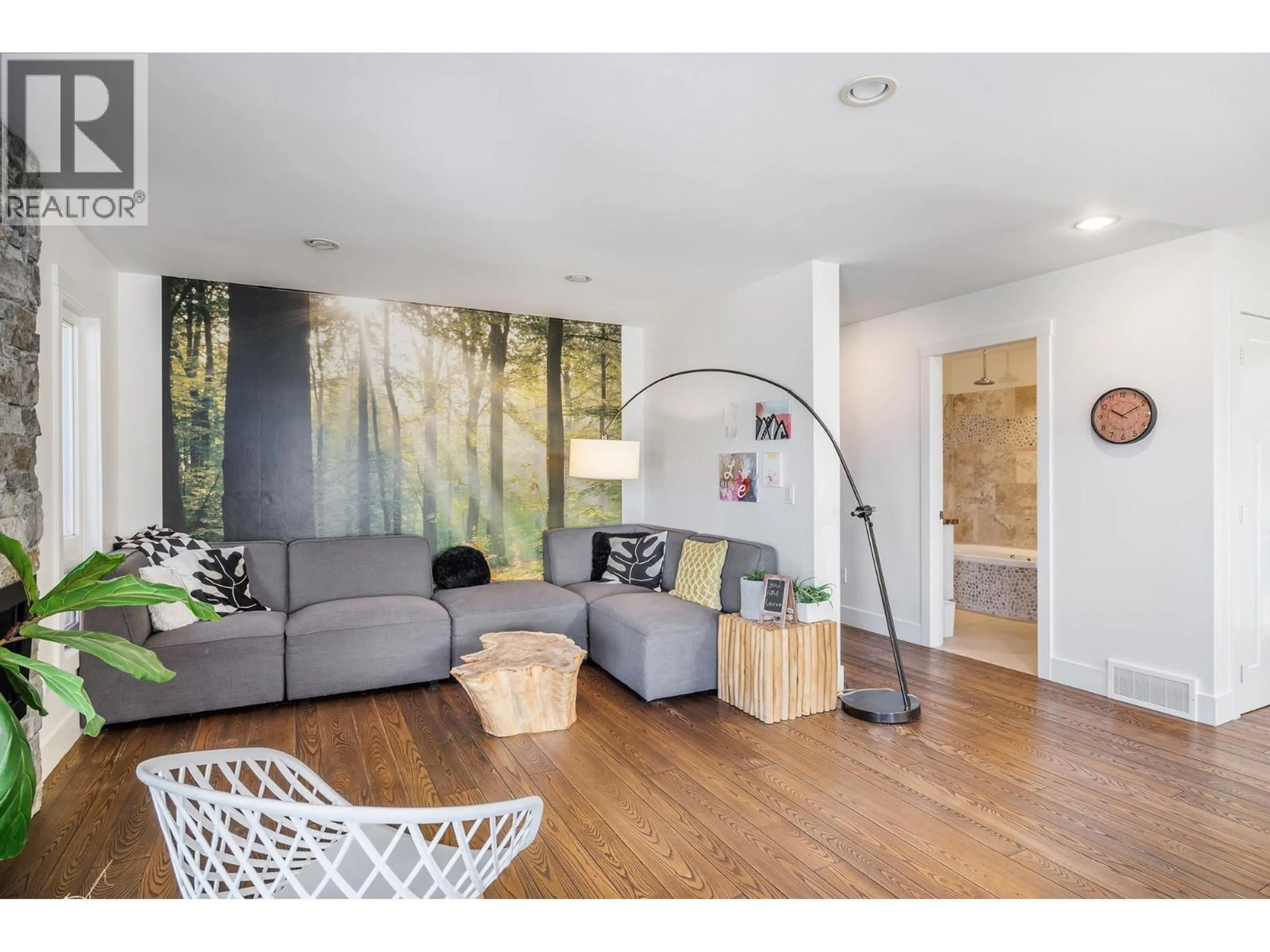 Living room with furniture, wood/laminate floor for 2020 GOLDIE ROAD, Lake Country British Columbia V4V1G5