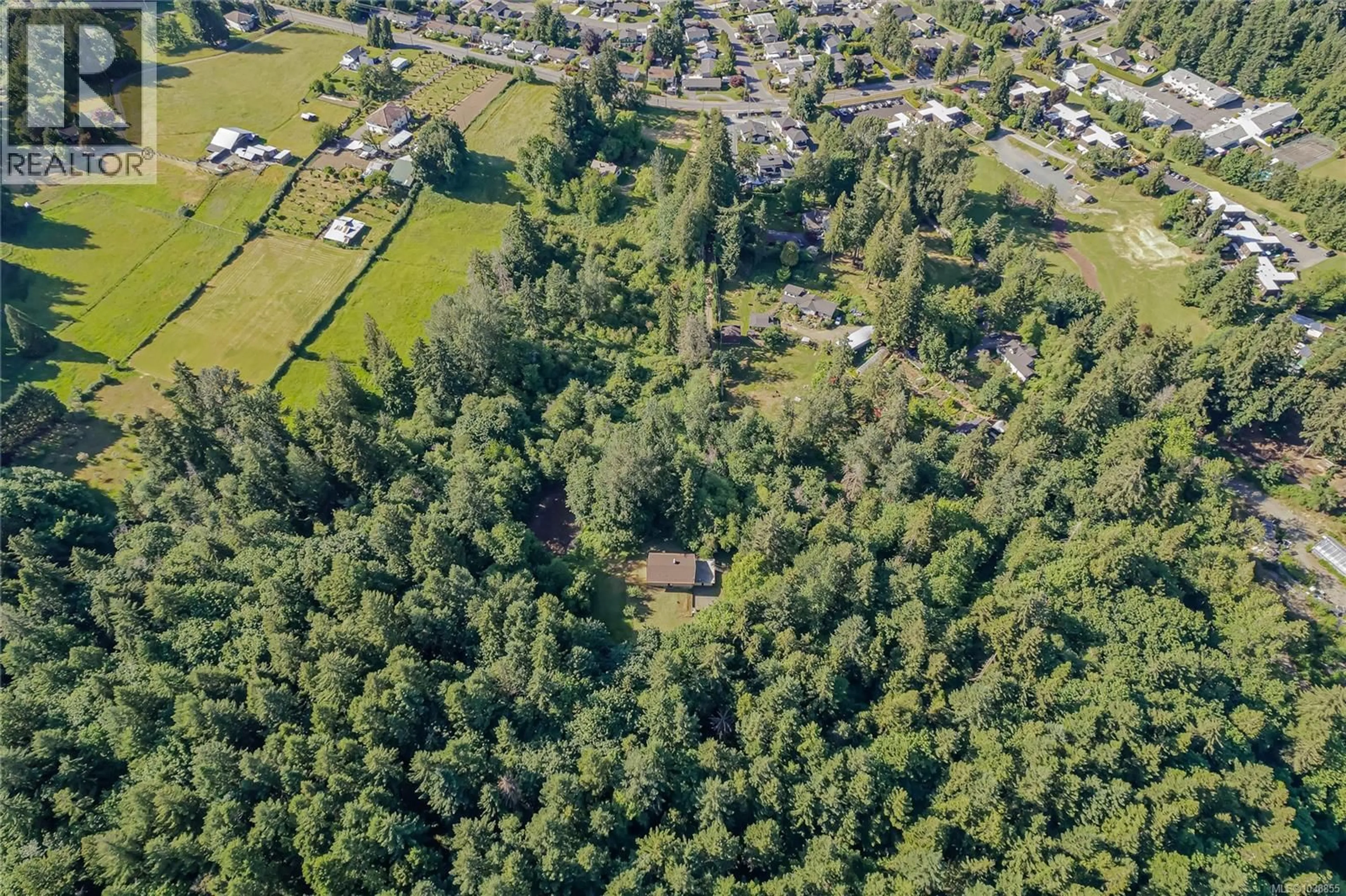 A pic from outside/outdoor area/front of a property/back of a property/a pic from drone, forest/trees view for 3246 GIBBINS ROAD, Duncan British Columbia V9L1G8