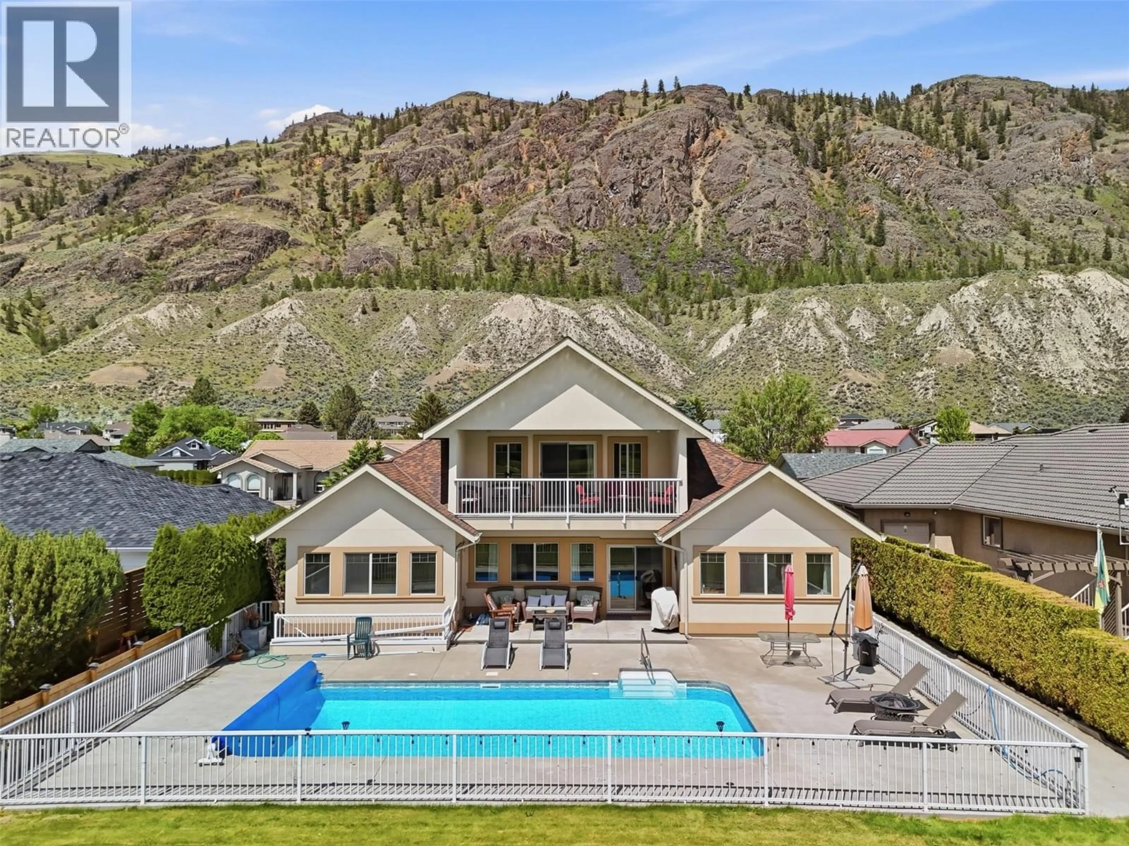 A pic from outside/outdoor area/front of a property/back of a property/a pic from drone, mountain view for 417 NUEVA WYND, Kamloops British Columbia V2H1S1