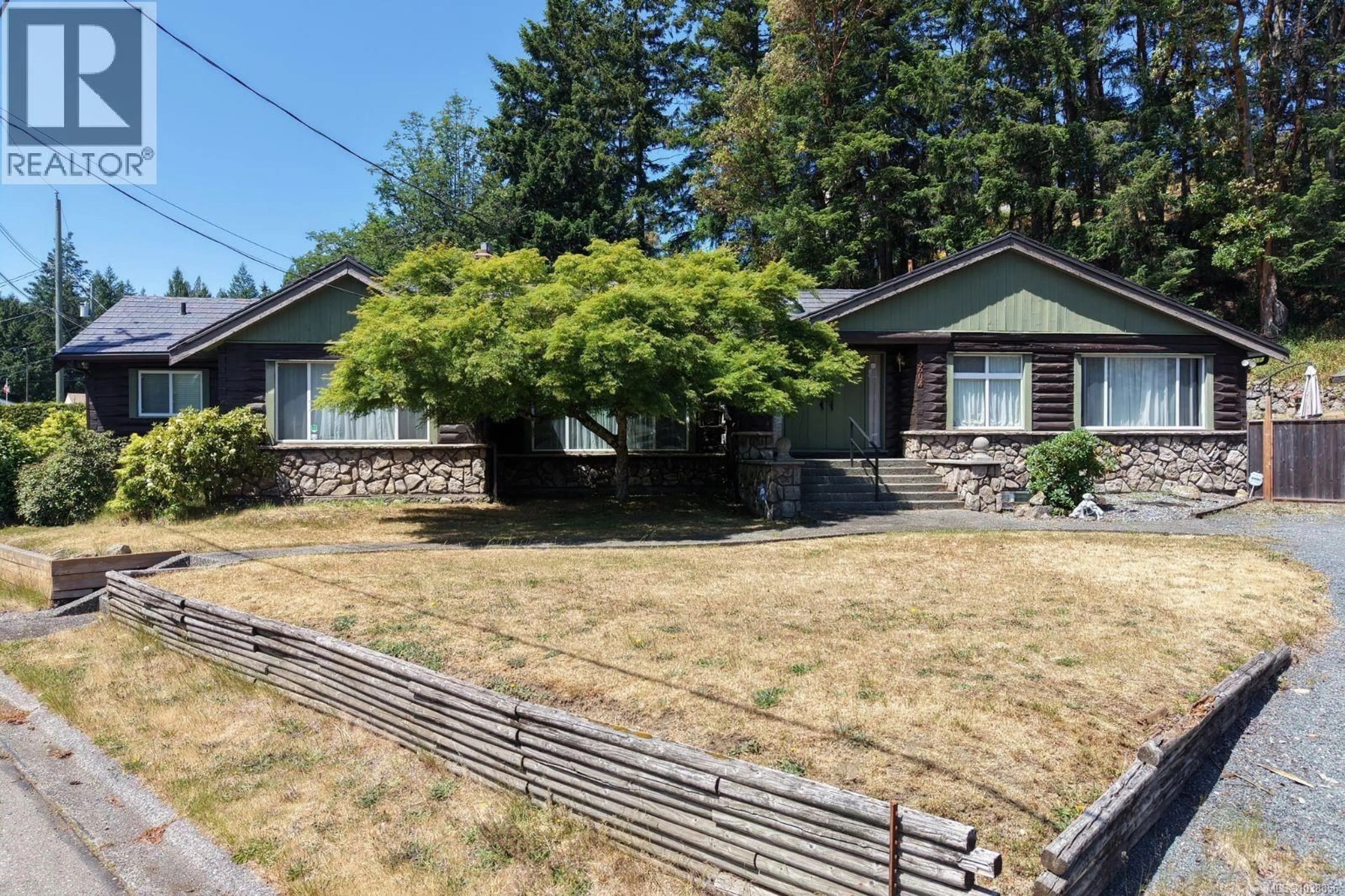 A pic from outside/outdoor area/front of a property/back of a property/a pic from drone, street for 3604 ROCKCLIFFE DRIVE, Nanaimo British Columbia V9T5S2
