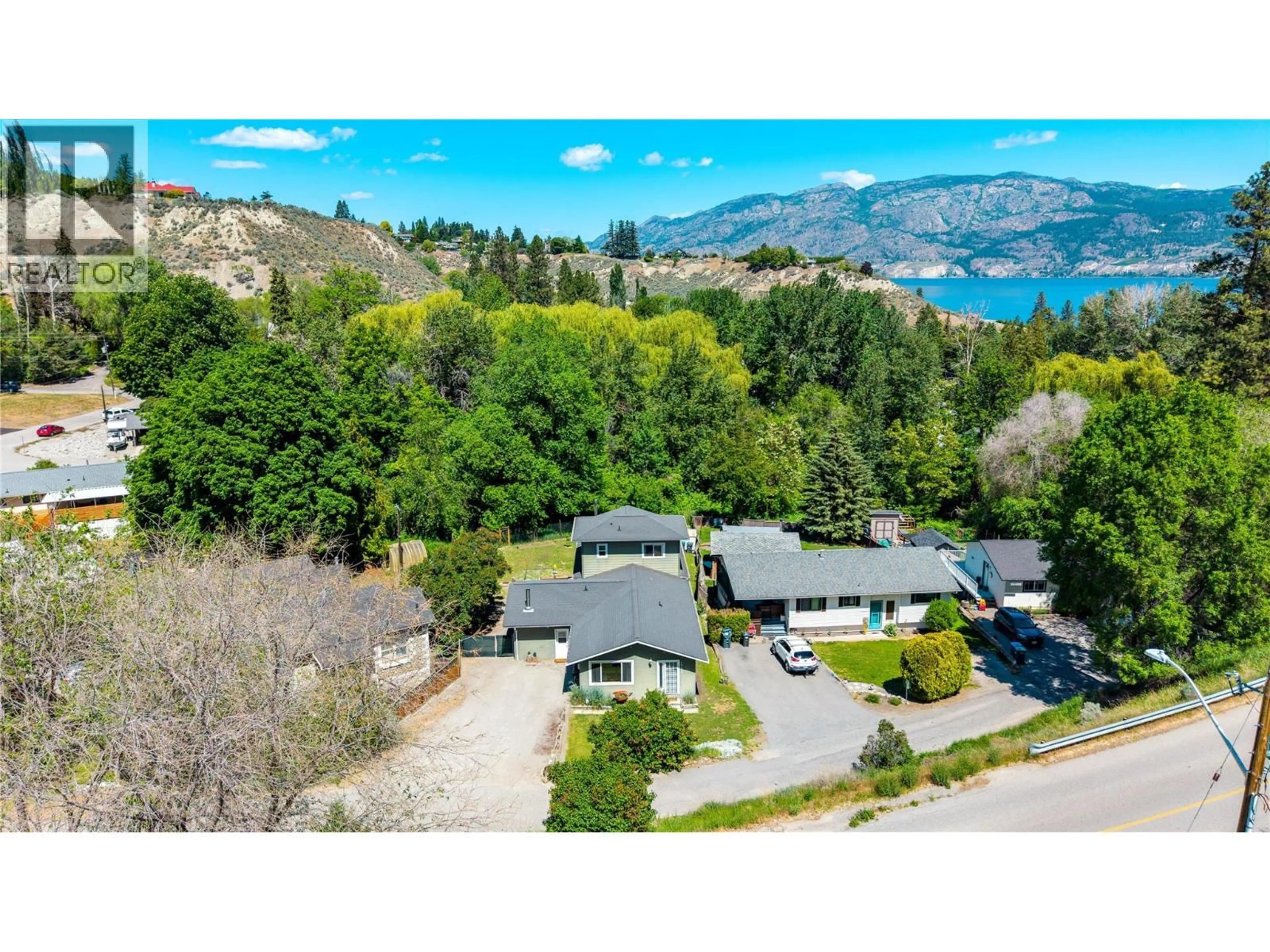 A pic from outside/outdoor area/front of a property/back of a property/a pic from drone, mountain view for 14406 LATIMER AVENUE, Summerland British Columbia V0H1Z0