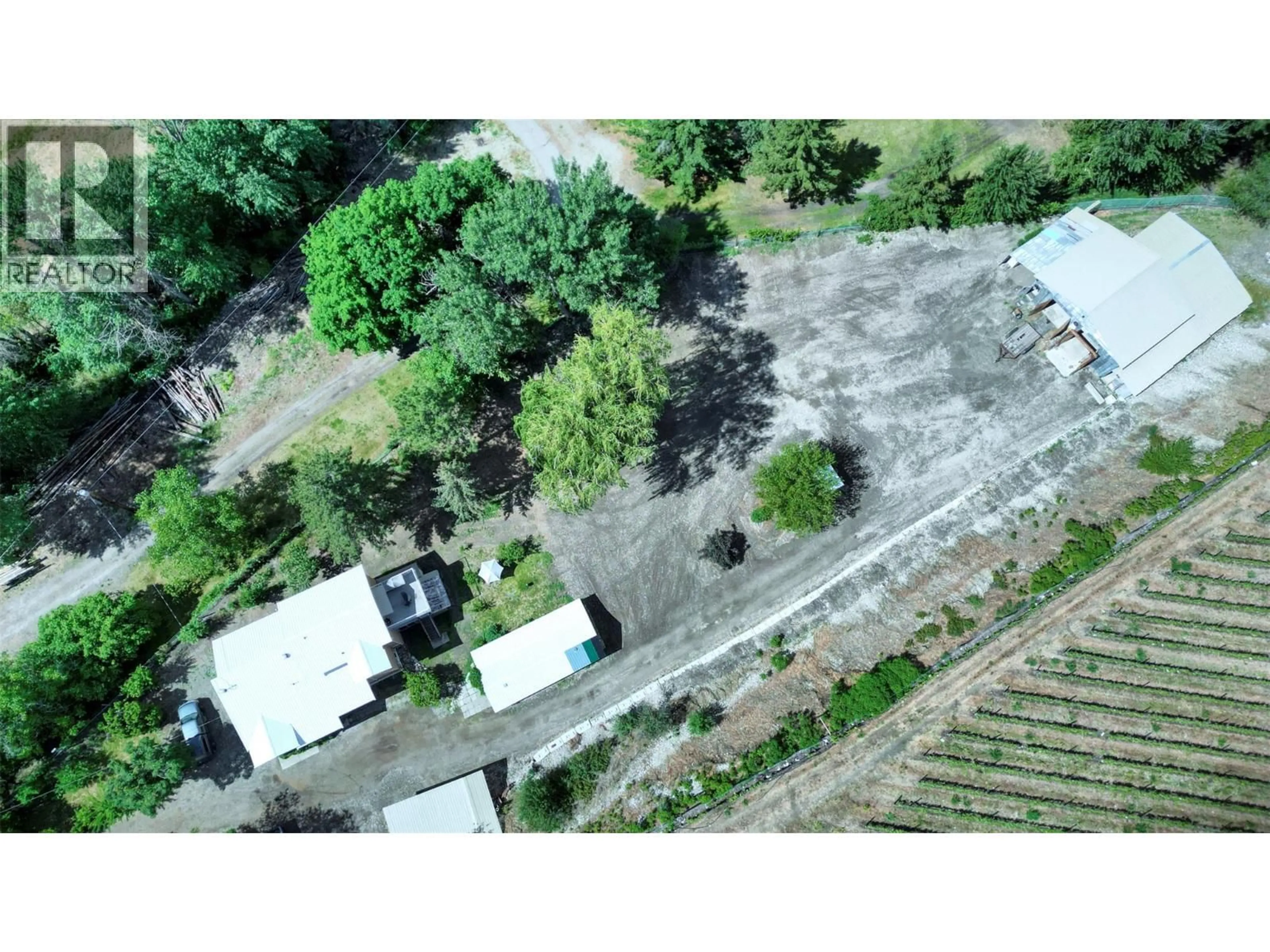 A pic from outside/outdoor area/front of a property/back of a property/a pic from drone, unknown for 204 GREASEWOOD AVENUE, Oliver British Columbia V0H1T1