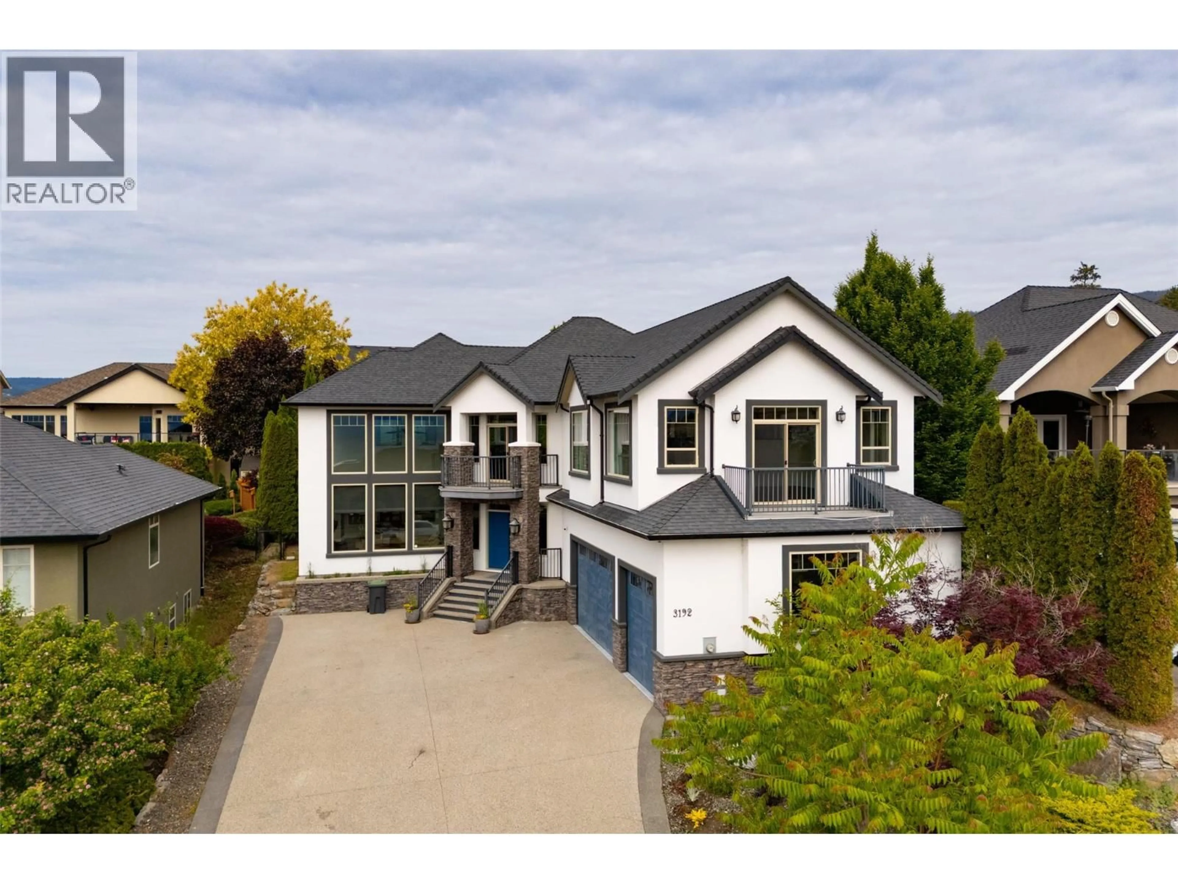 A pic from outside/outdoor area/front of a property/back of a property/a pic from drone, street for 3192 VINEYARD VIEW DRIVE, West Kelowna British Columbia V4T3B4