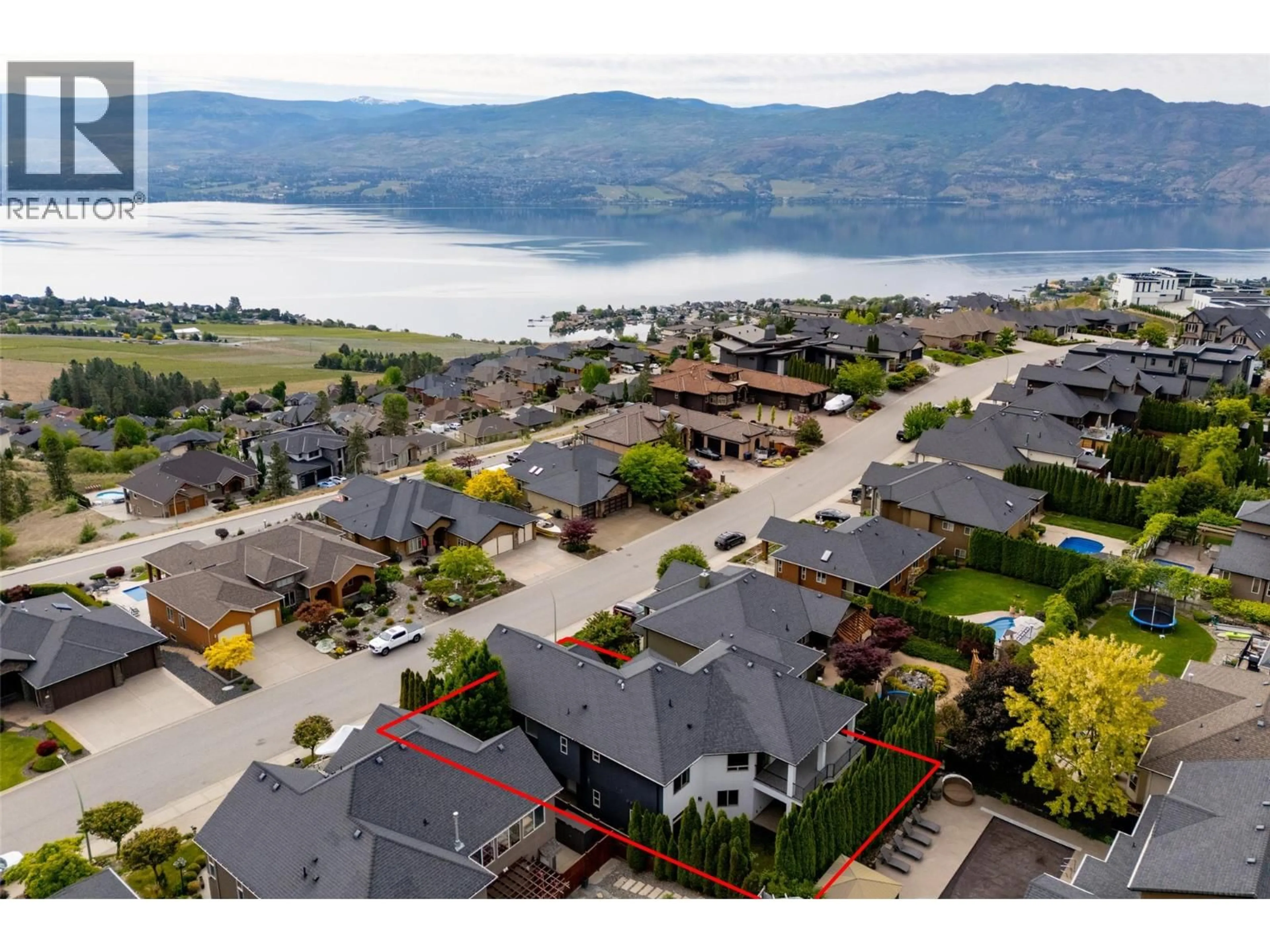 A pic from outside/outdoor area/front of a property/back of a property/a pic from drone, water/lake/river/ocean view for 3192 VINEYARD VIEW DRIVE, West Kelowna British Columbia V4T3B4