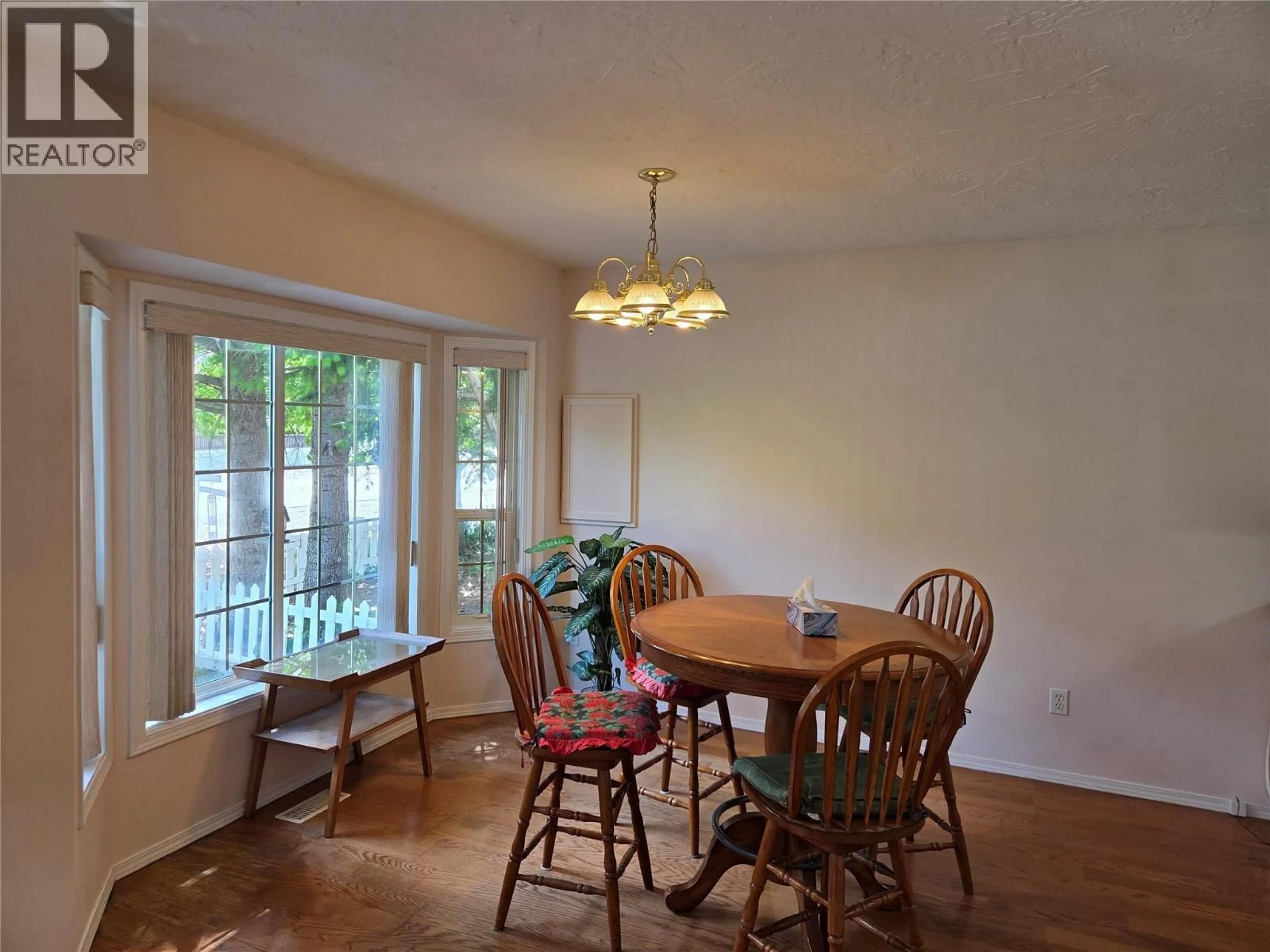 Dining room, wood/laminate floor for 410 6TH AVENUE, Keremeos British Columbia V0X1N3