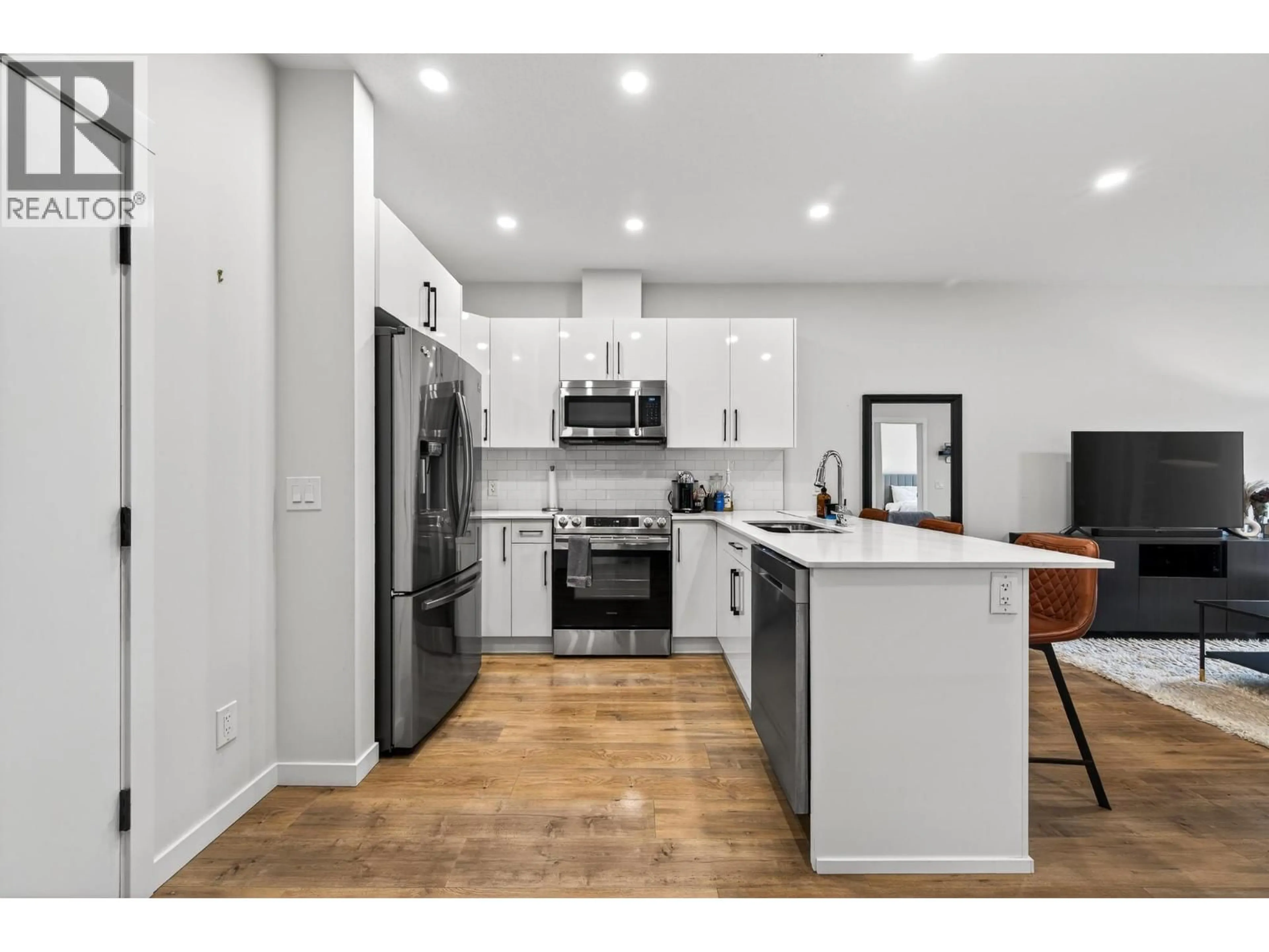 Open concept kitchen, wood/laminate floor for 305 - 1880 HUGH ALLAN DRIVE, Kamloops British Columbia V1S0E8