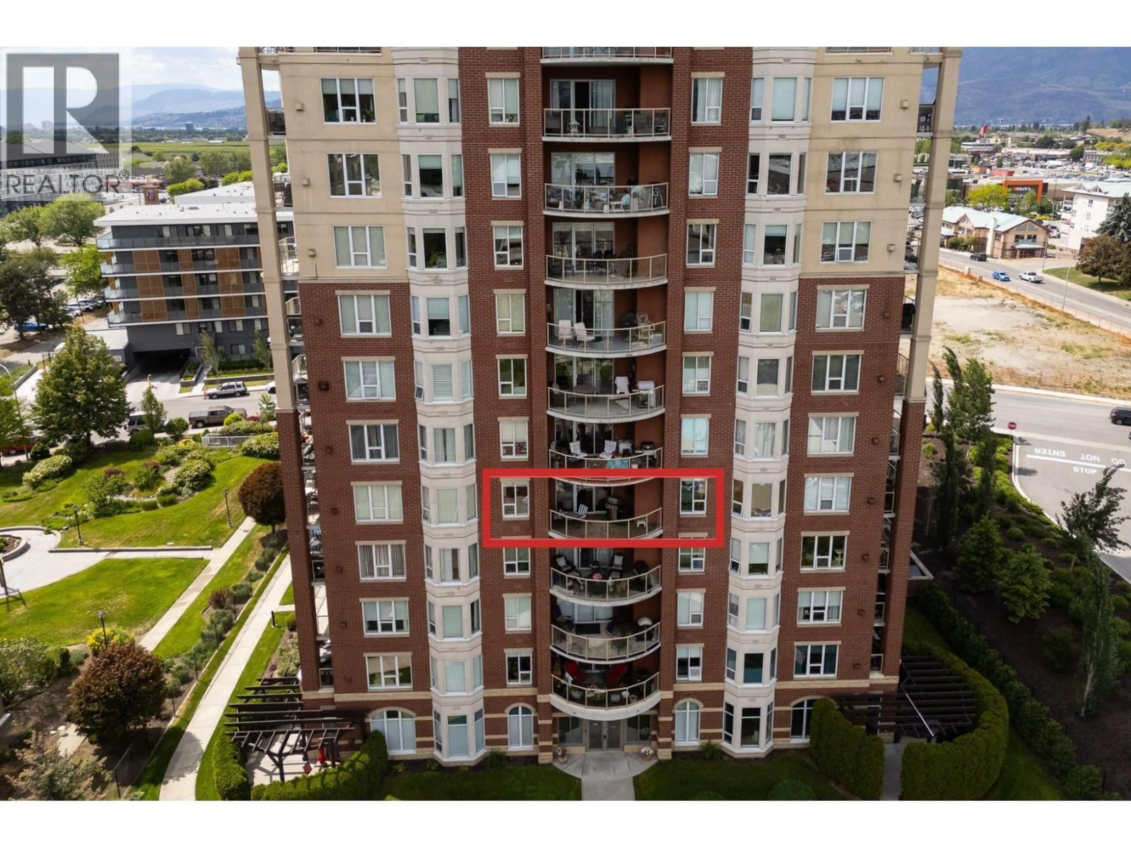 A pic from outside/outdoor area/front of a property/back of a property/a pic from drone, building for 502 - 1947 UNDERHILL STREET, Kelowna British Columbia V1X7K5