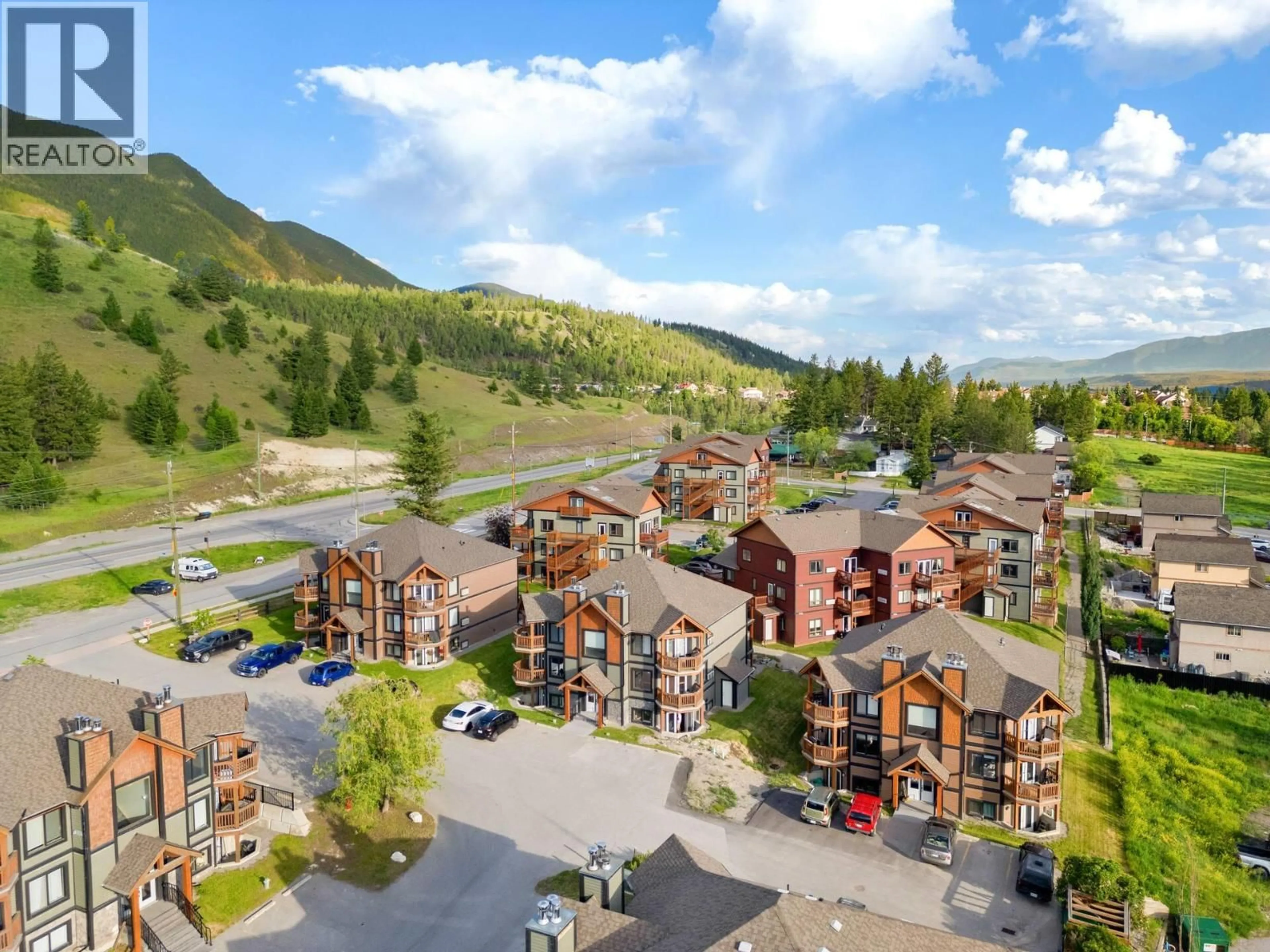 A pic from outside/outdoor area/front of a property/back of a property/a pic from drone, mountain view for 202 - 7307 PROSPECTOR AVENUE, Radium Hot Springs British Columbia V0A1M0