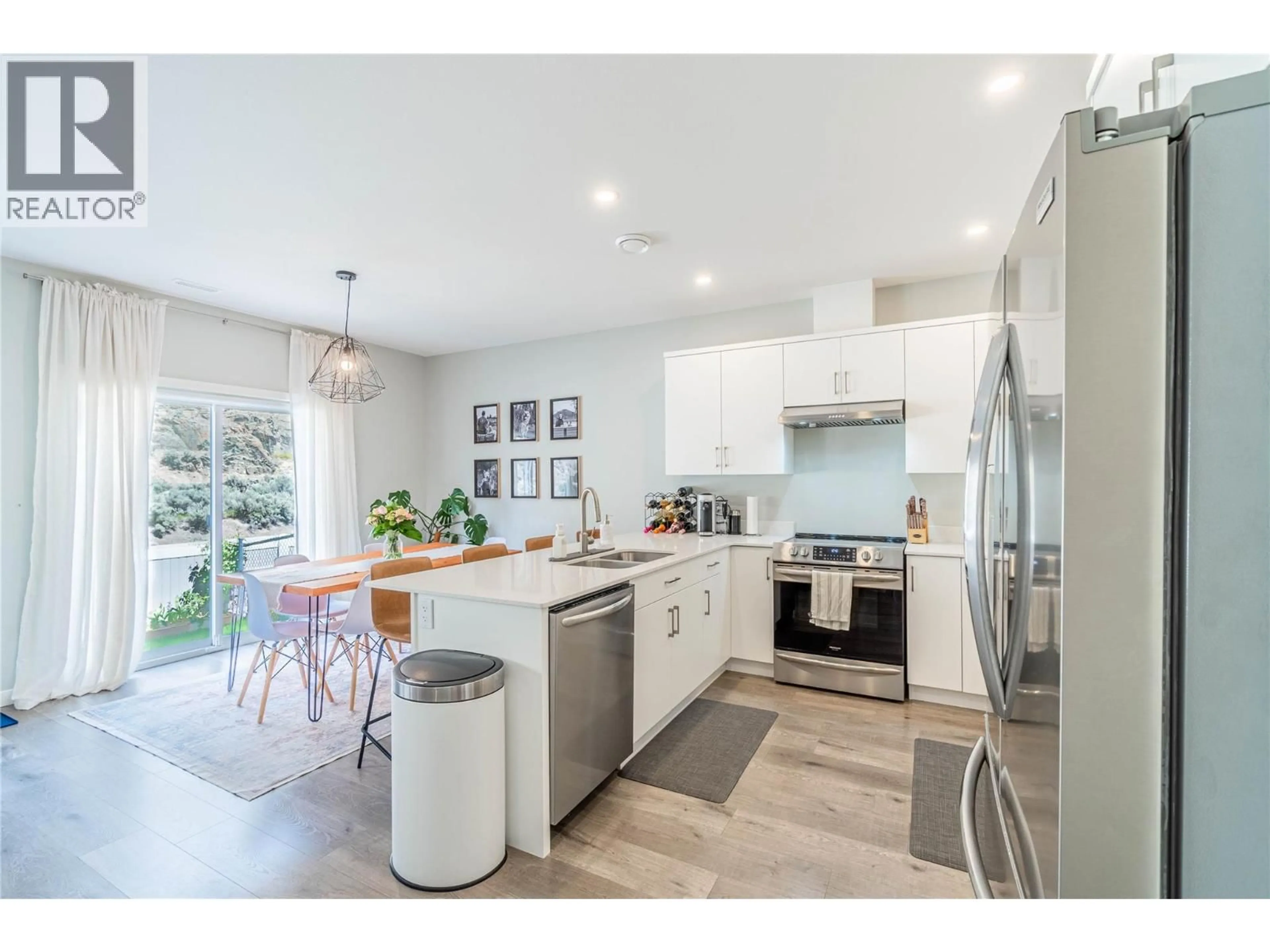 Open concept kitchen, unknown for 107 - 2683 ORD ROAD, Kamloops British Columbia V2B2J2