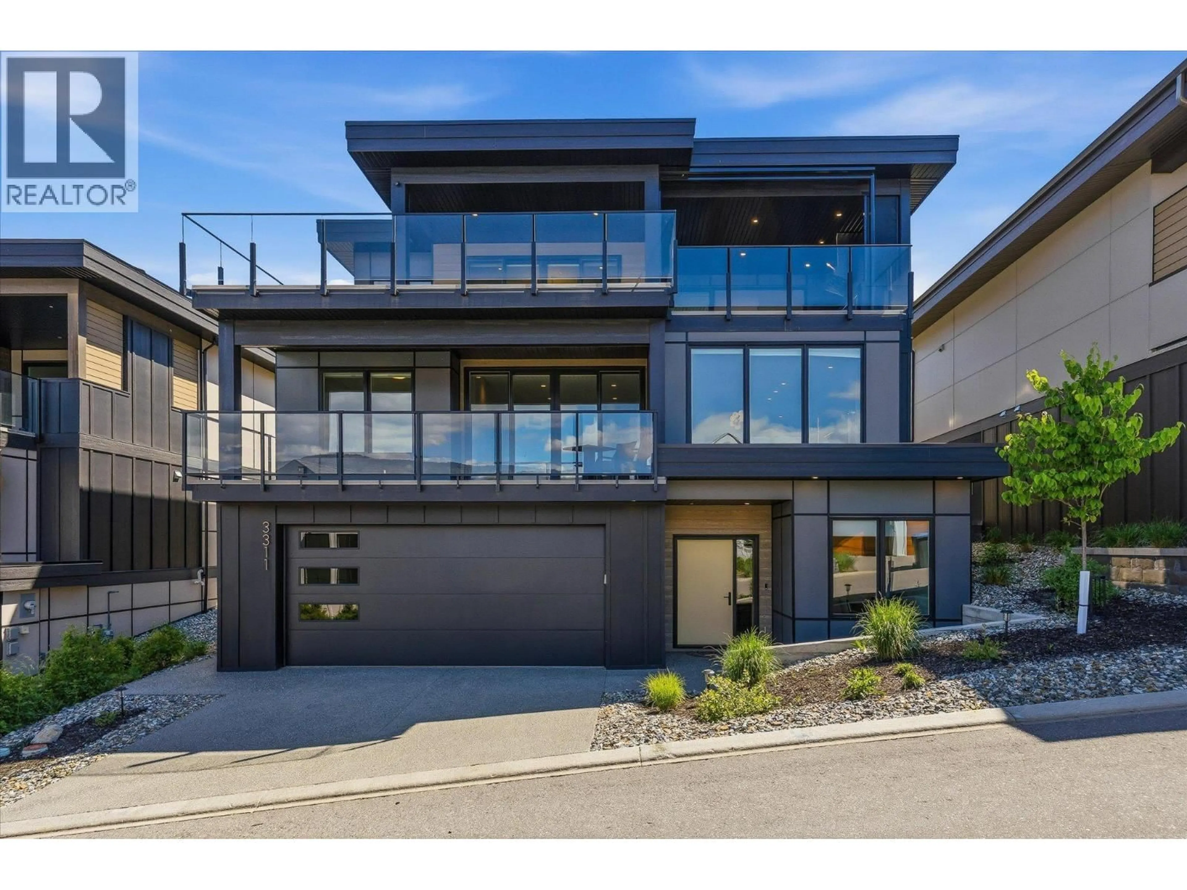 Home with brick exterior material, street for 3311 ASPEN LANE, Kelowna British Columbia V1V0C6