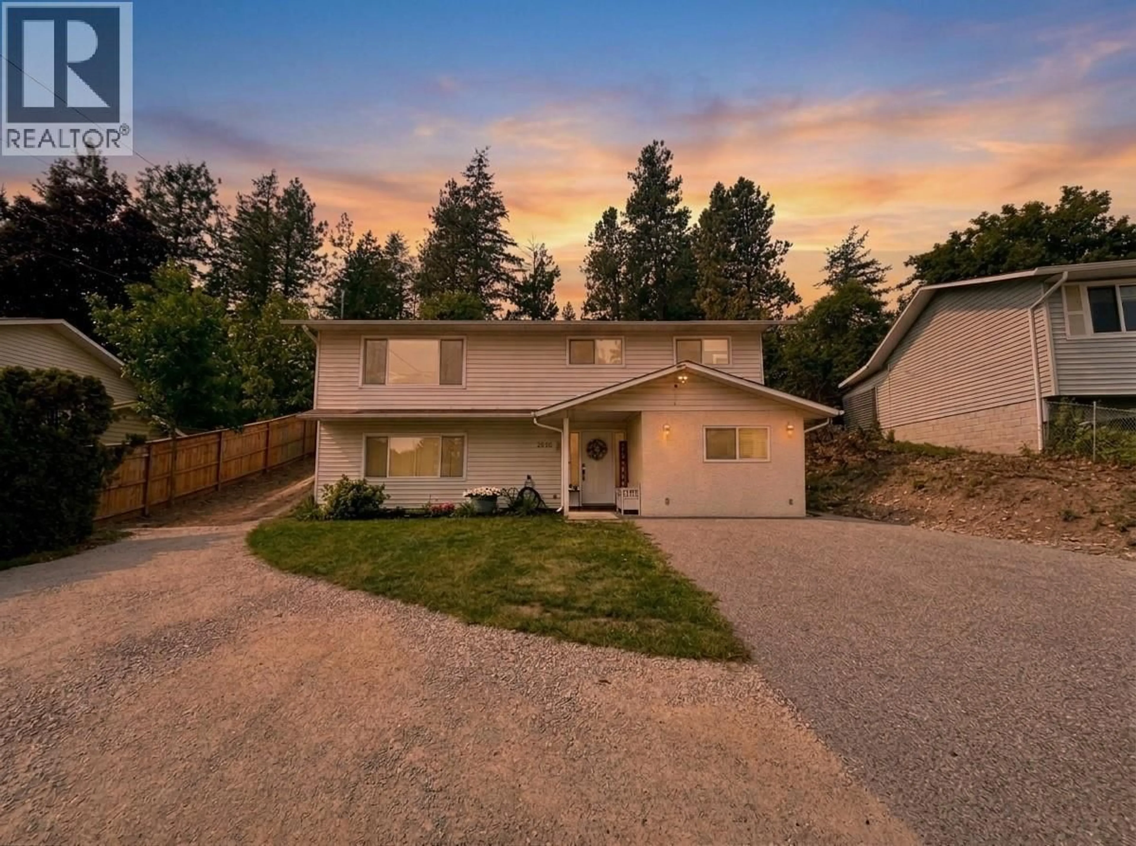A pic from outside/outdoor area/front of a property/back of a property/a pic from drone, mountain view for 3530 CHIVES PLACE, West Kelowna British Columbia V4T1H8