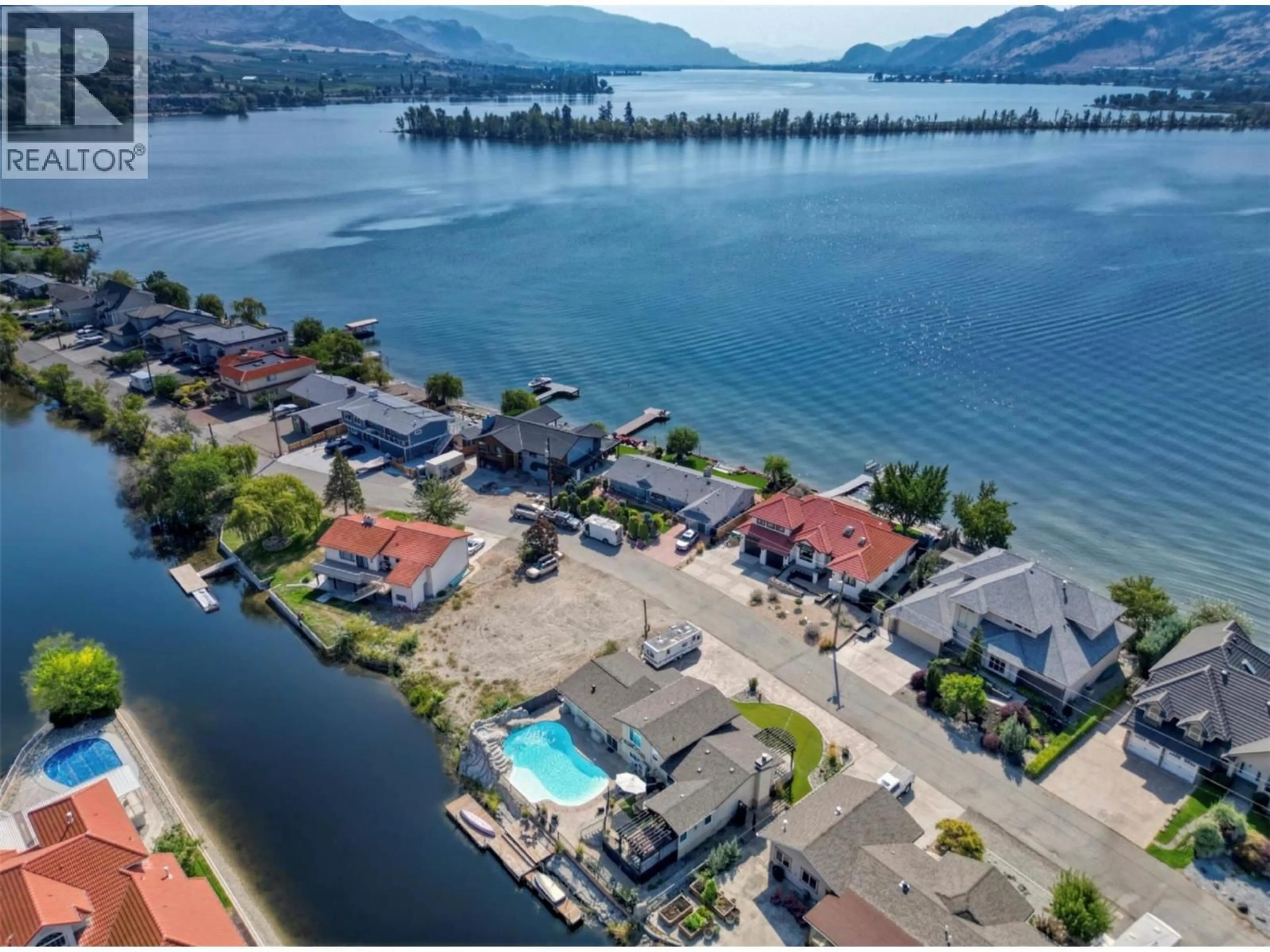 A pic from outside/outdoor area/front of a property/back of a property/a pic from drone, water/lake/river/ocean view for 52 HARBOUR KEY DRIVE, Osoyoos British Columbia V0H1V3