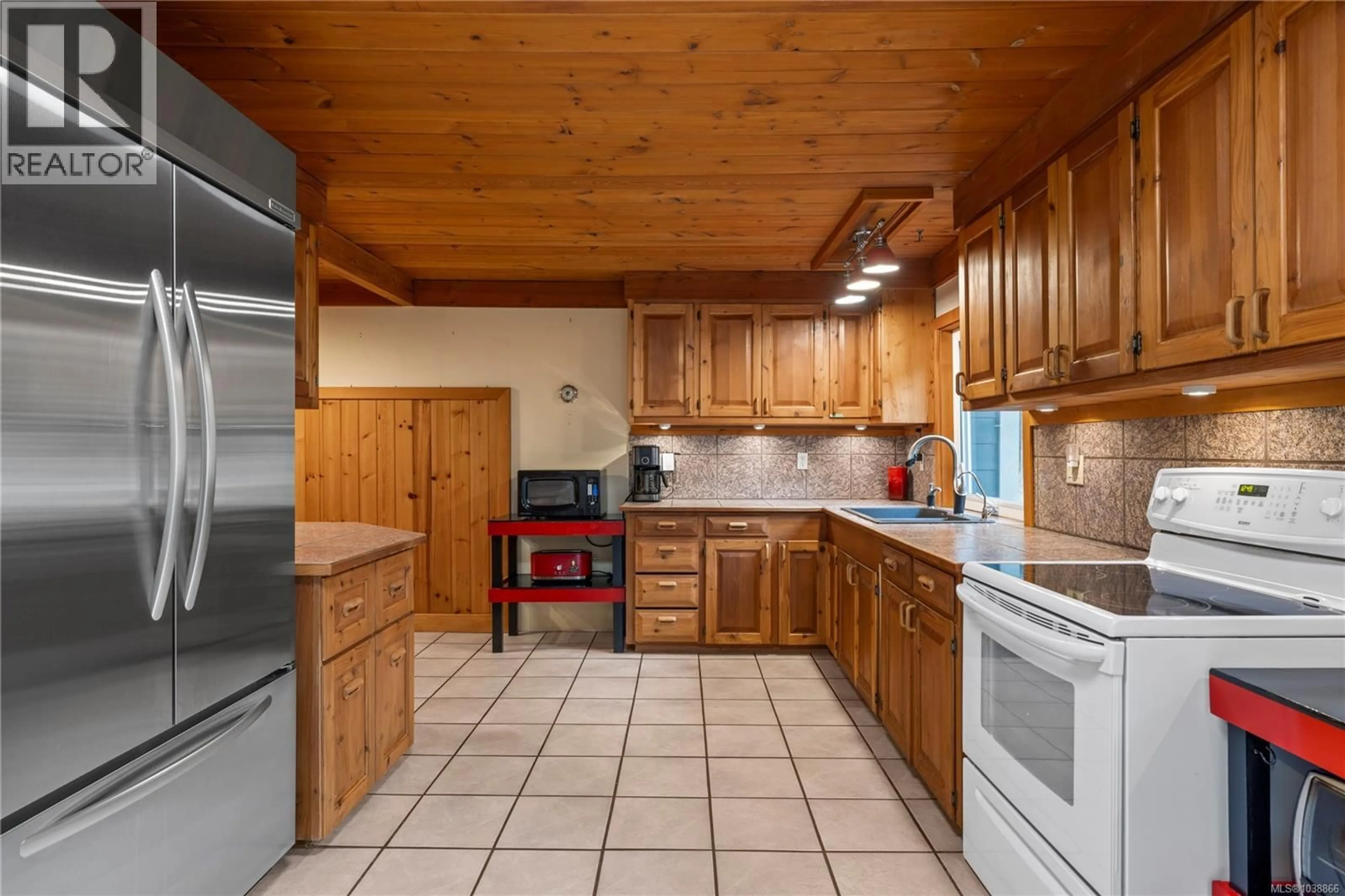 Standard kitchen, ceramic/tile floor for 550 CORCAN ROAD, Qualicum Beach British Columbia V9K2E9