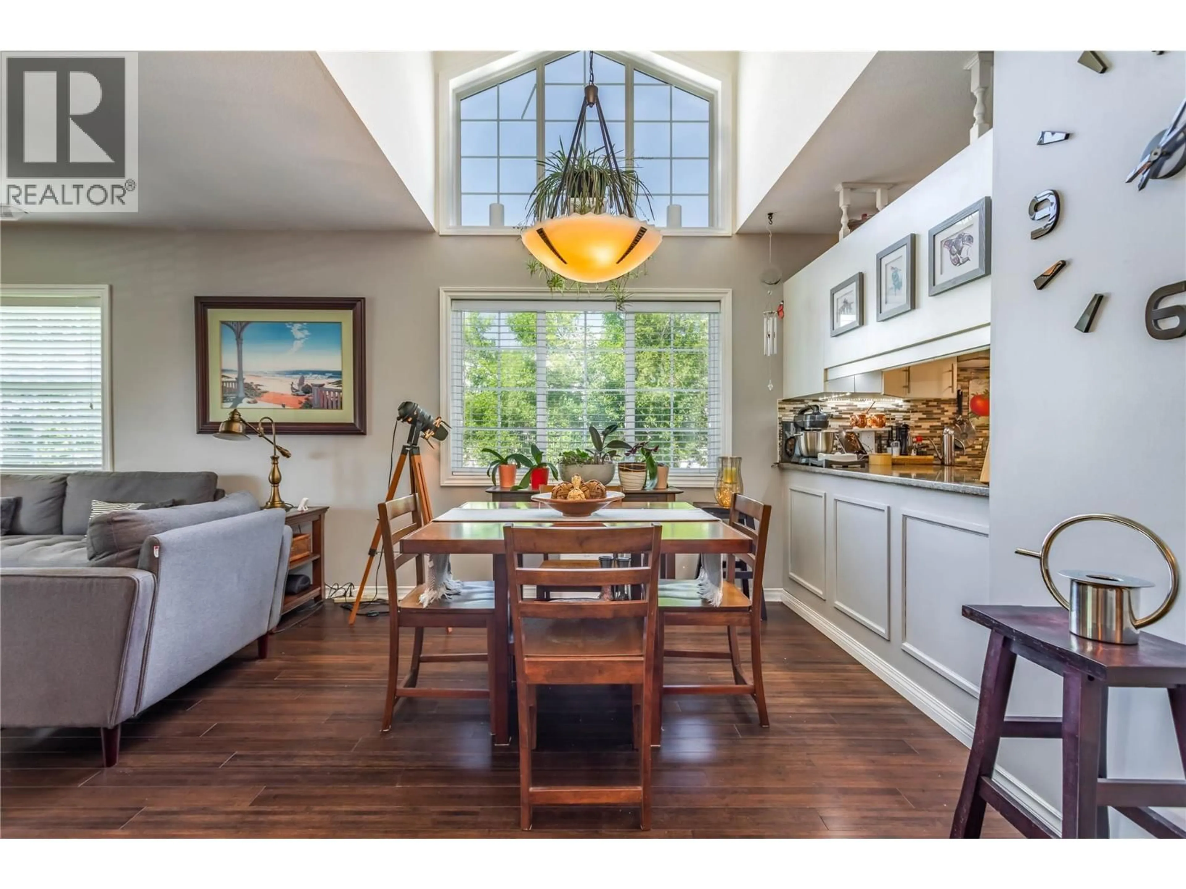 Open concept kitchen, wood/laminate floor for 218 - 2370 STILLINGFLEET ROAD, Kelowna British Columbia V1W3X8