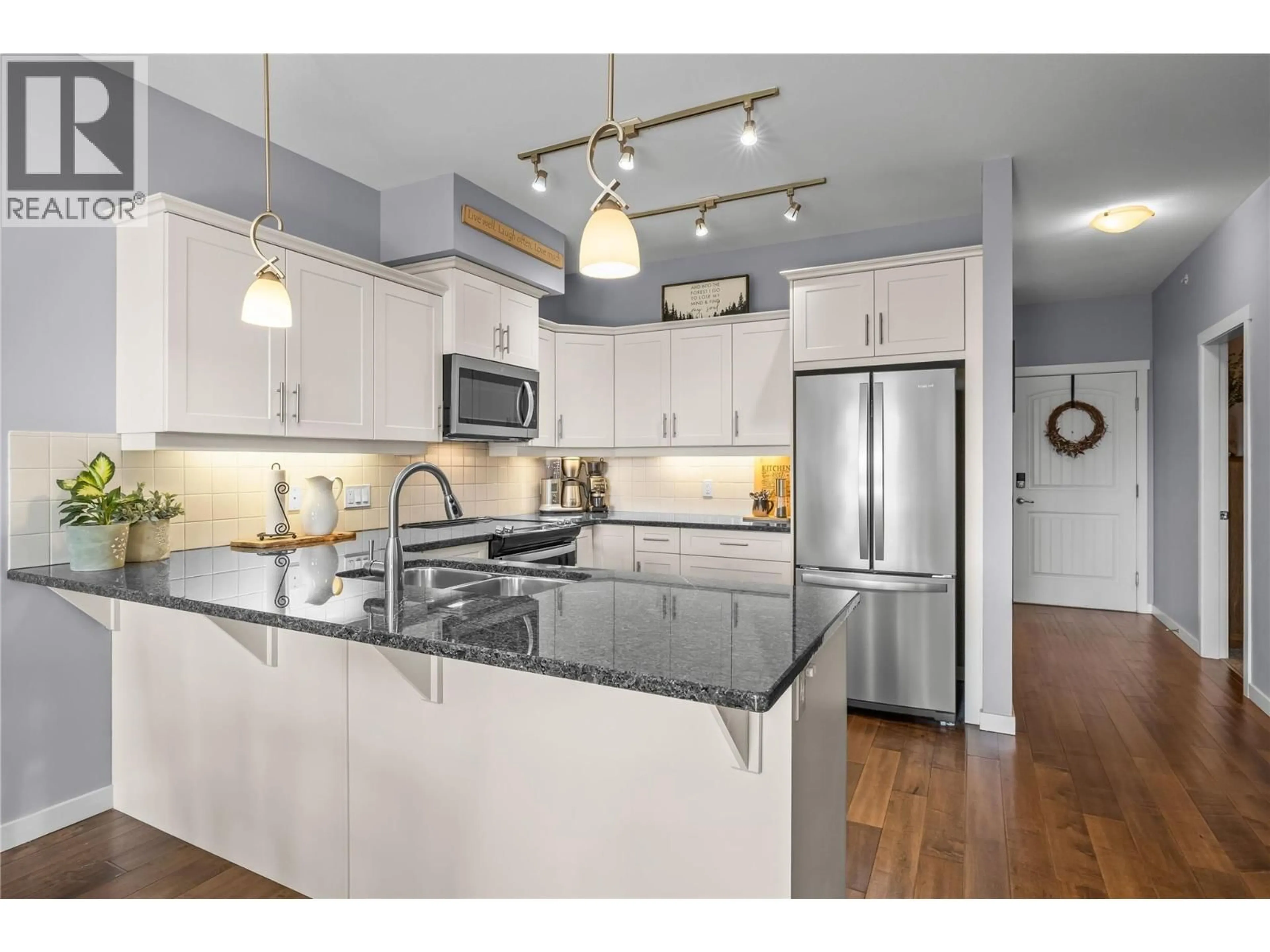 Open concept kitchen, unknown for 410 - 3735 CASORSO ROAD, Kelowna British Columbia V1W5G1