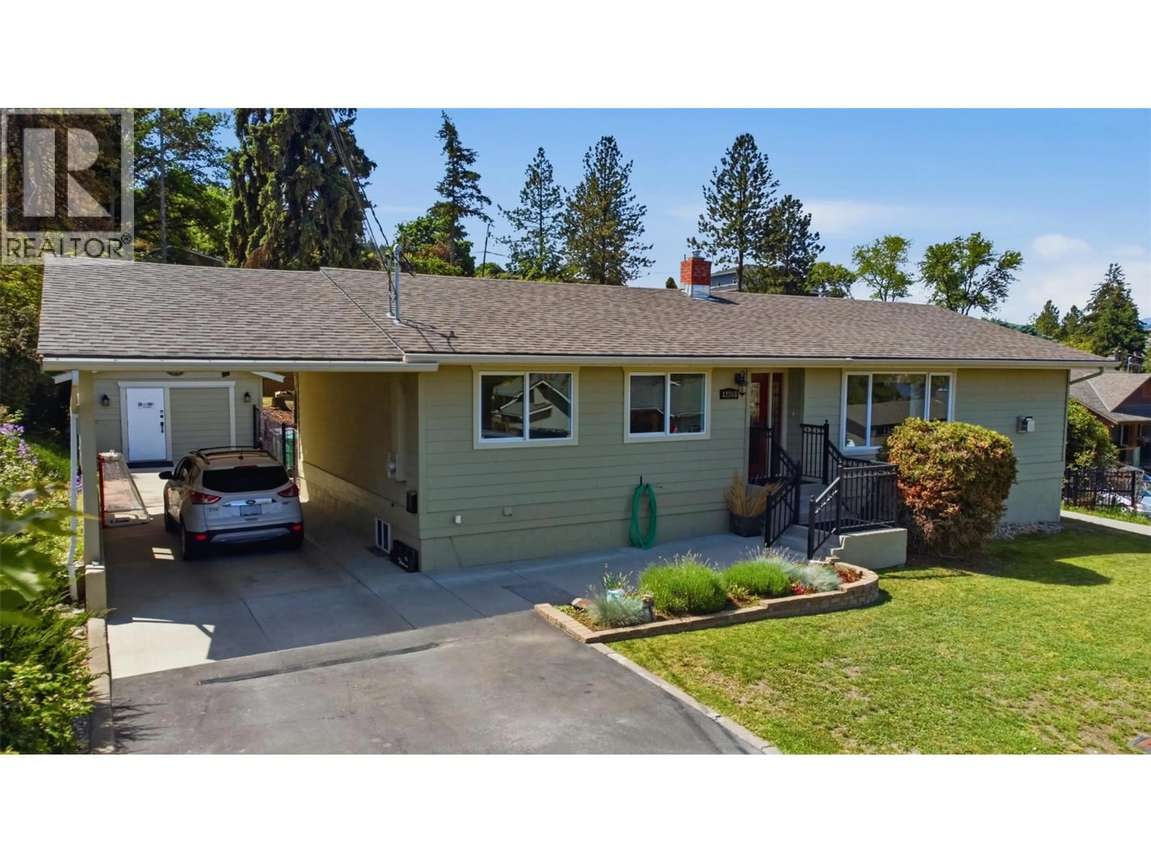 A pic from outside/outdoor area/front of a property/back of a property/a pic from drone, street for 12208 COLDSTREAM CREEK ROAD, Coldstream British Columbia V1B1G1