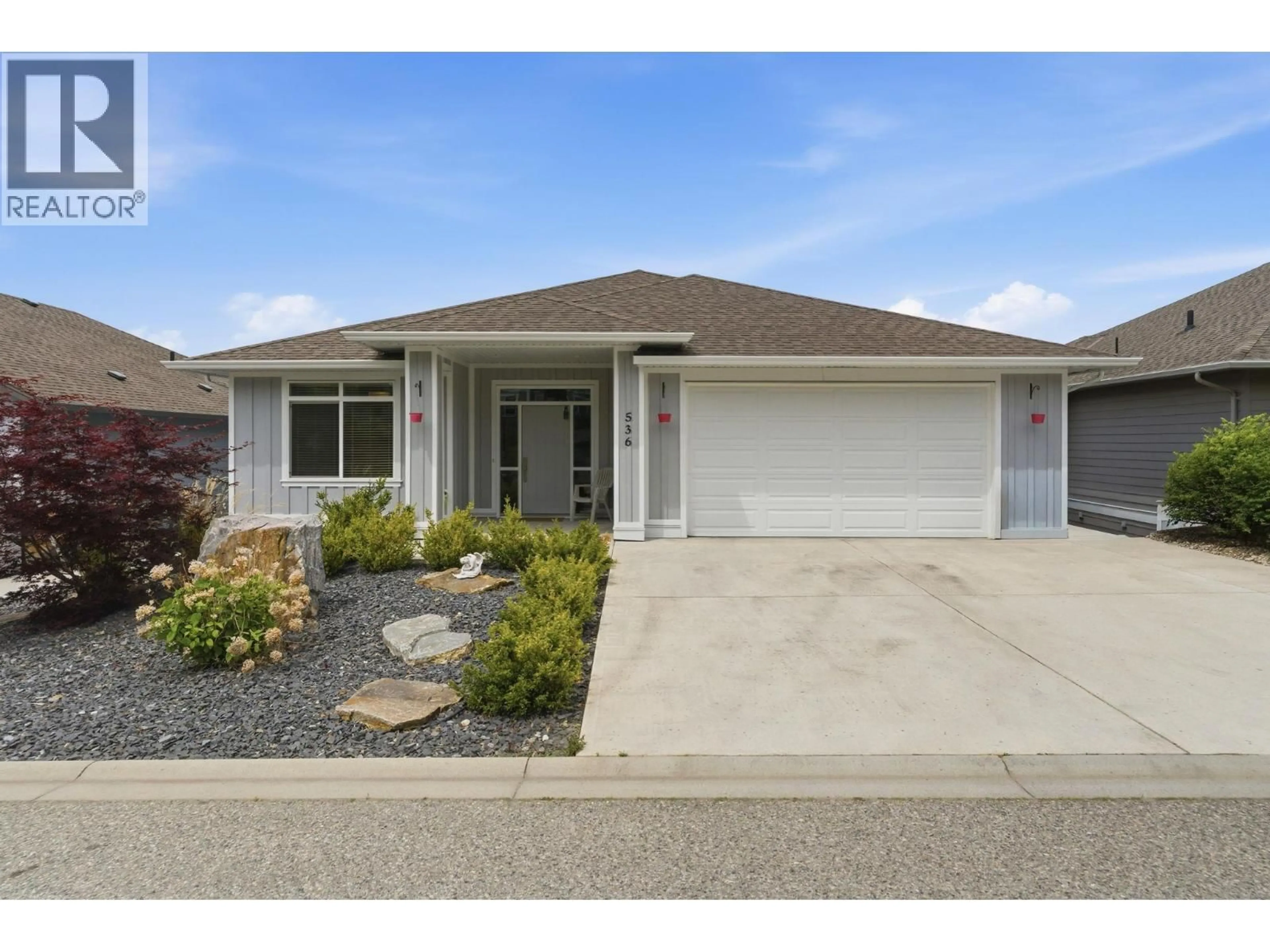 Home with vinyl exterior material, street for 536 TUNGSTEN COURT, Kelowna British Columbia V1W5J6
