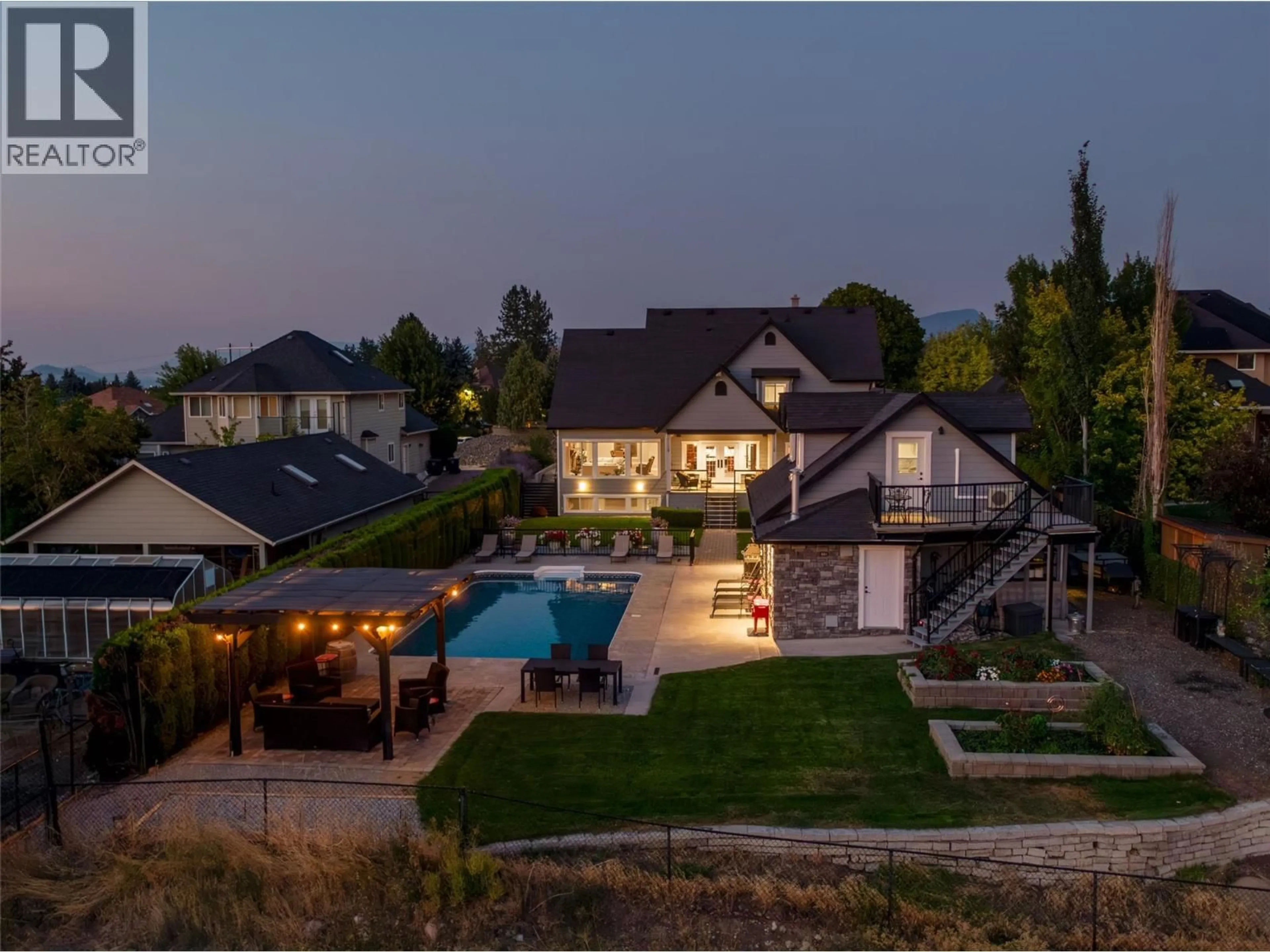 A pic from outside/outdoor area/front of a property/back of a property/a pic from drone, mountain view for 4830 WESTRIDGE DRIVE, Kelowna British Columbia V1W3B4